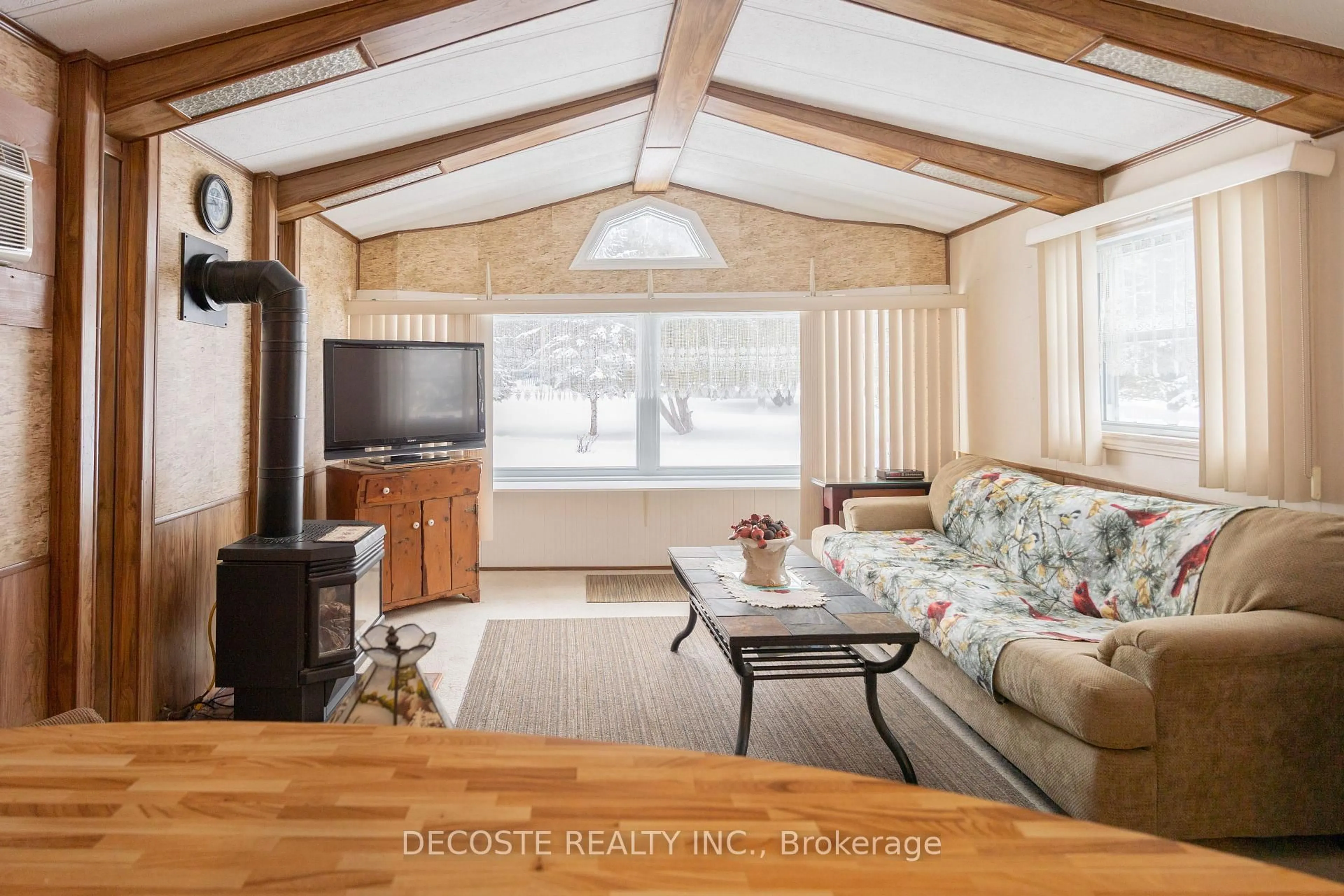 Living room with furniture, wood/laminate floor for 3857 Bobby St, North Glengarry Ontario K0C 1A0
