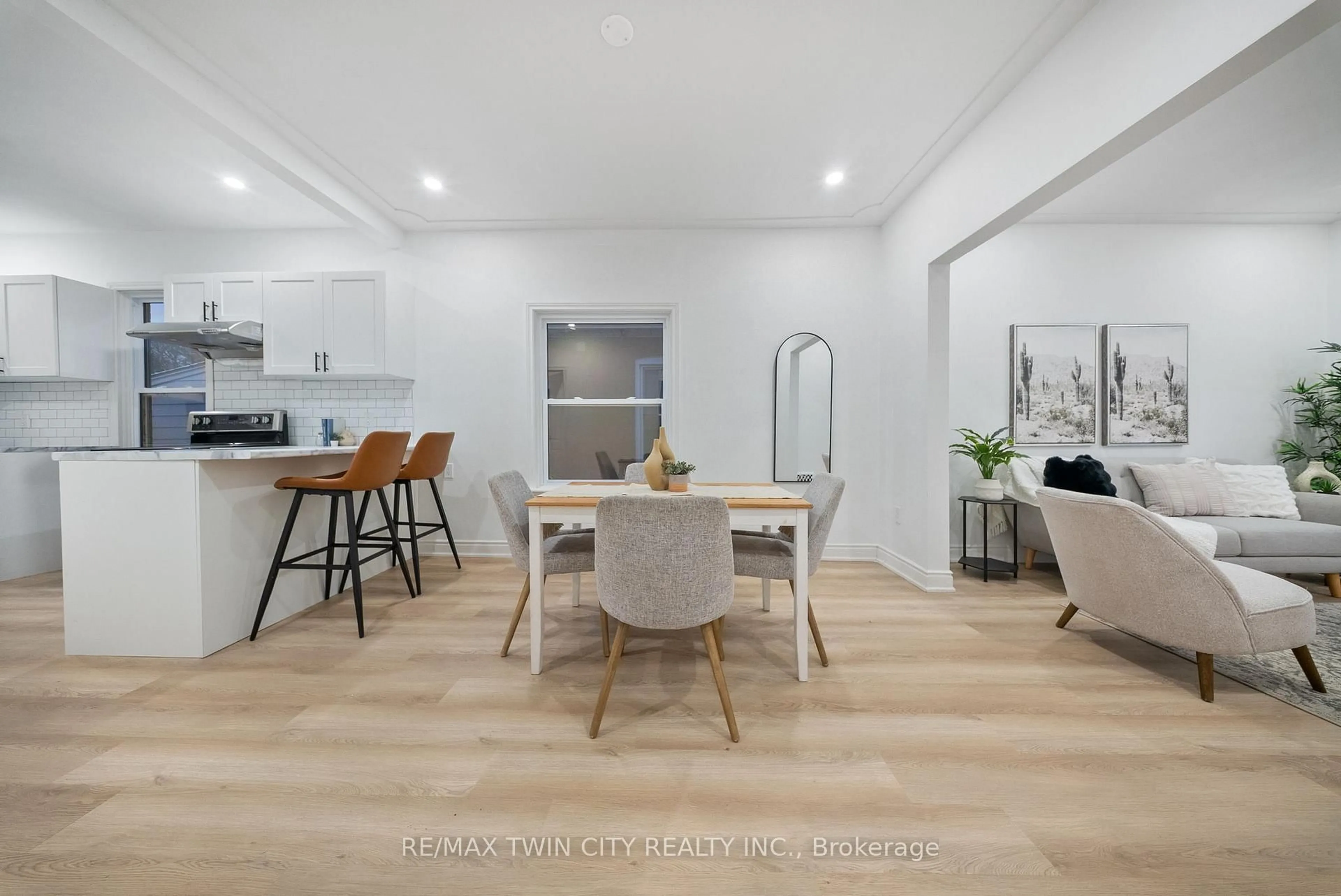 Open concept kitchen, wood/laminate floor for 12 Carlyle St, Brantford Ontario N3T 2C1