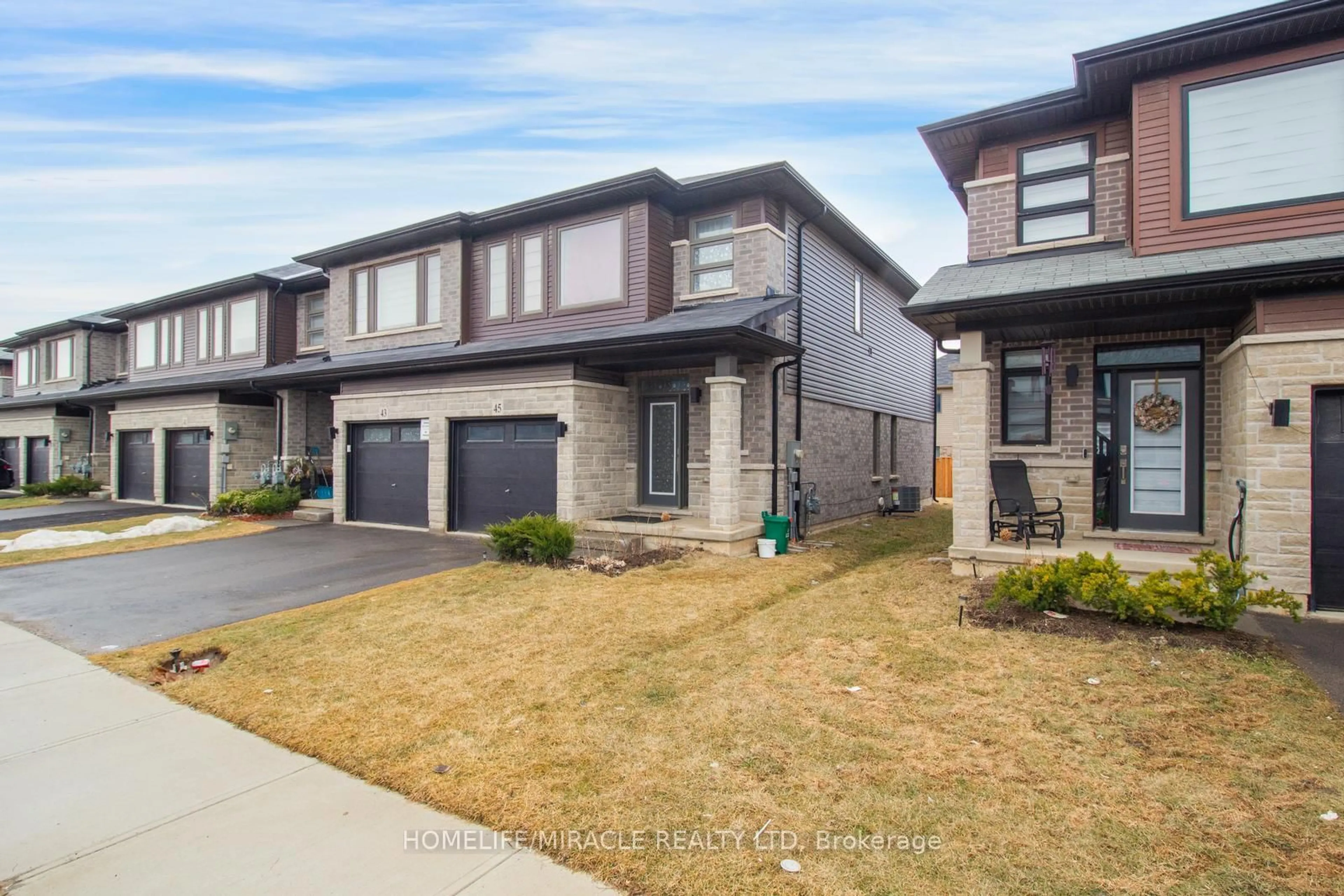 Home with brick exterior material, street for 45 June Callwood Way, Brantford Ontario N3T 0V1