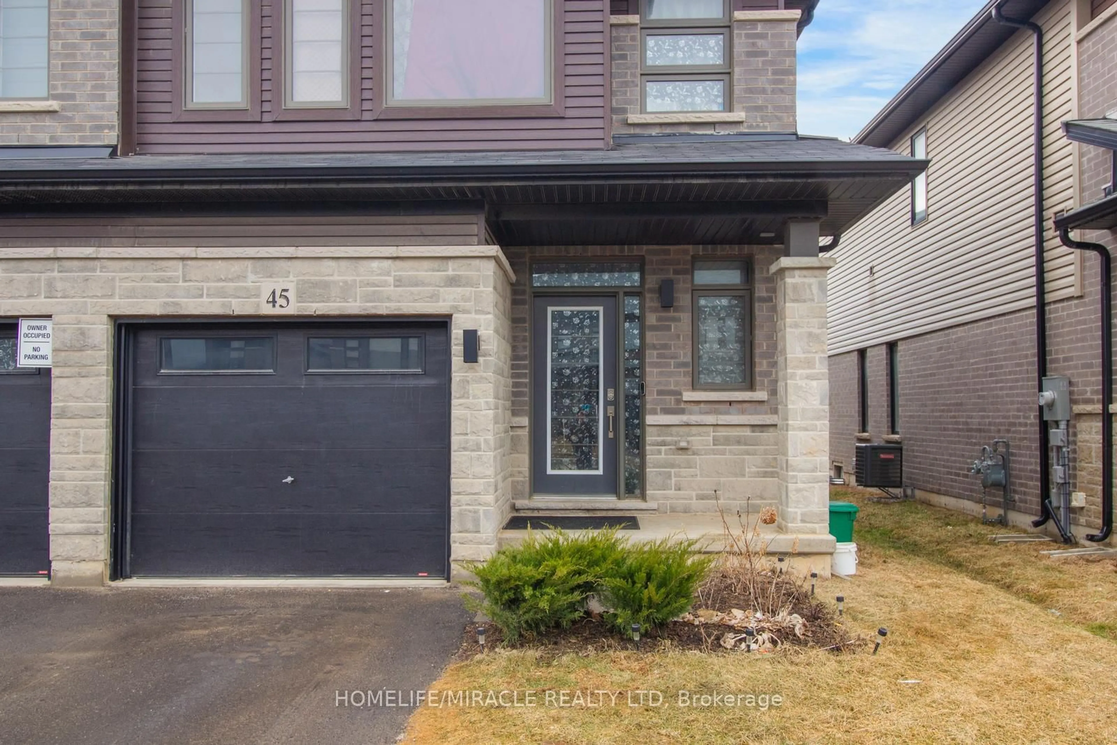 Home with brick exterior material, street for 45 June Callwood Way, Brantford Ontario N3T 0V1