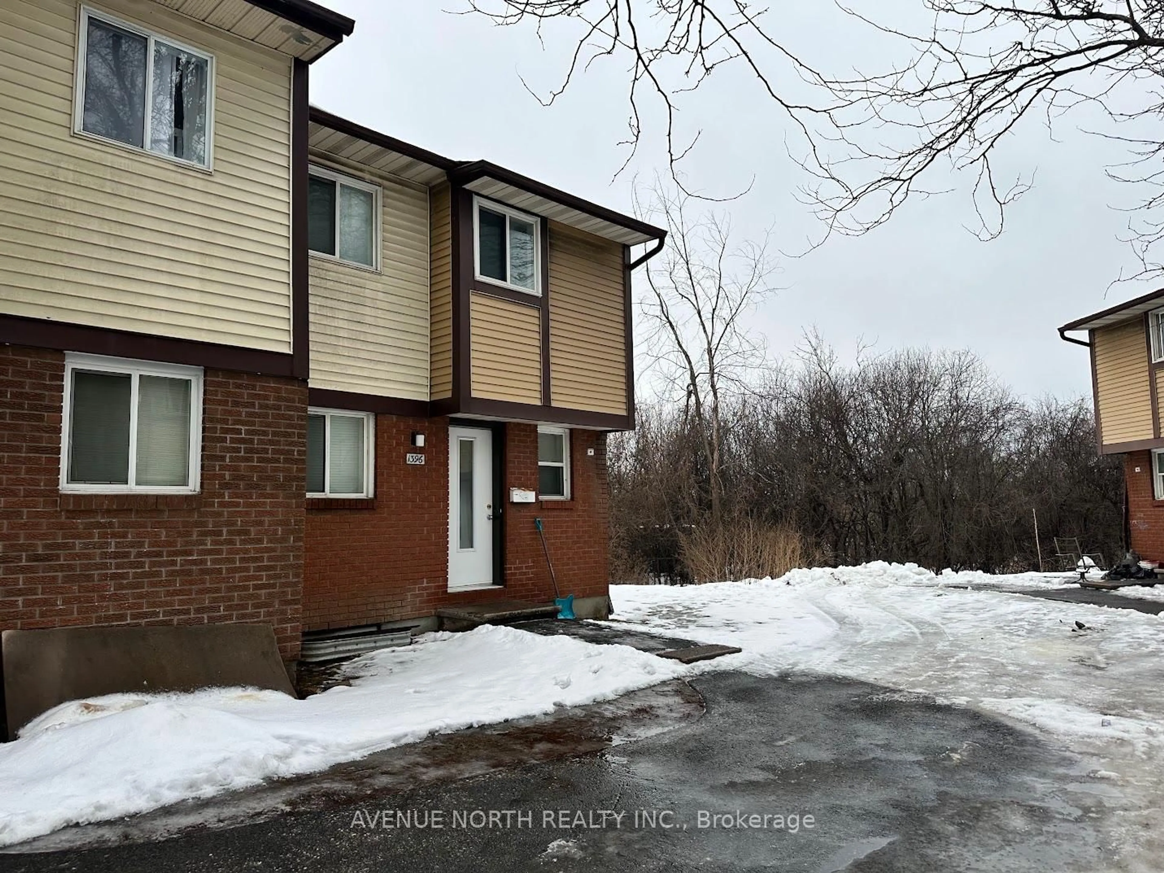 A pic from outside/outdoor area/front of a property/back of a property/a pic from drone, street for 1396 Foxwell St #110, Ottawa Ontario K1B 5J2