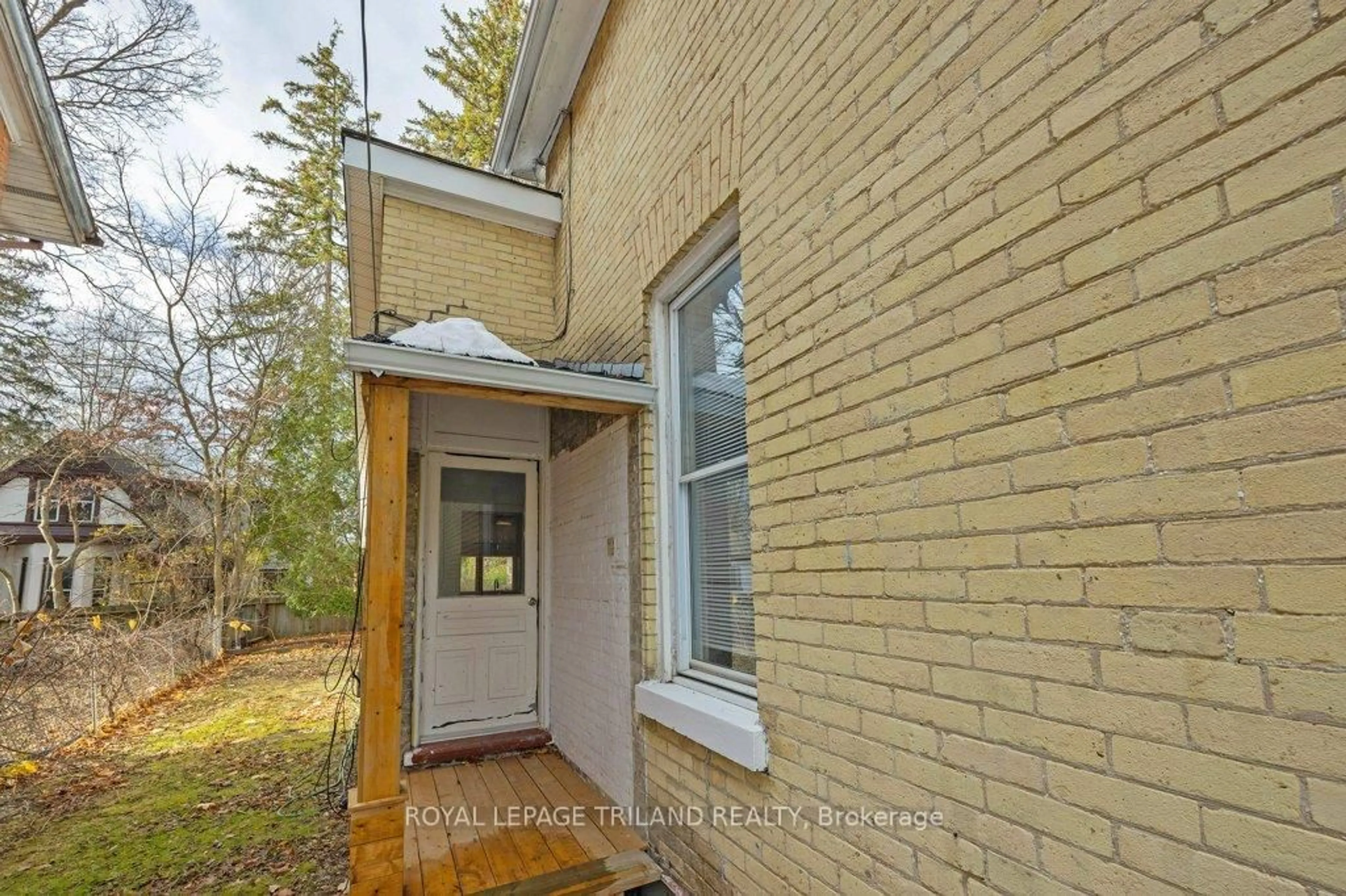 Home with brick exterior material, street for 1053 RICHMOND St, London East Ontario N6A 3J7
