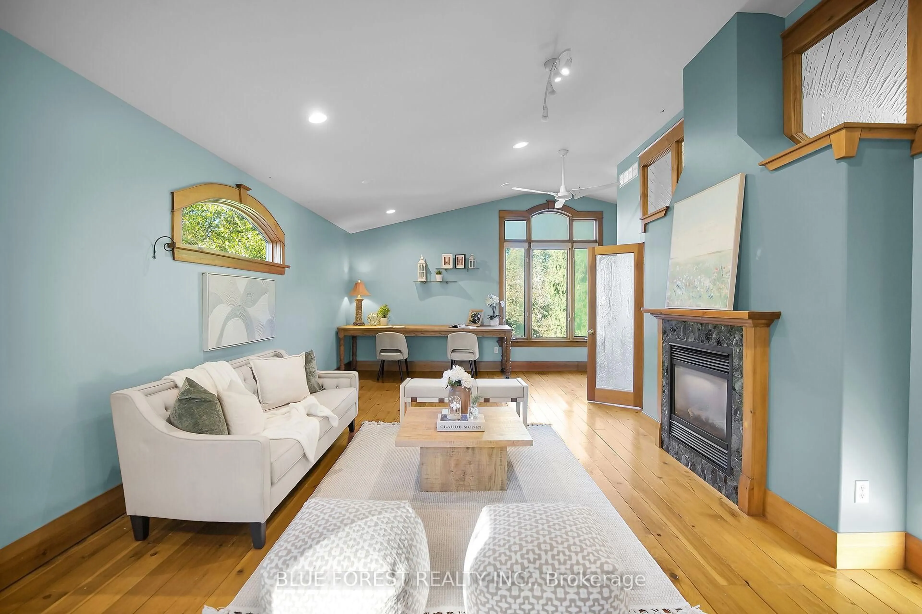 Living room with furniture, wood/laminate floor for 281 Cathcart St, London South Ontario N6C 3N6