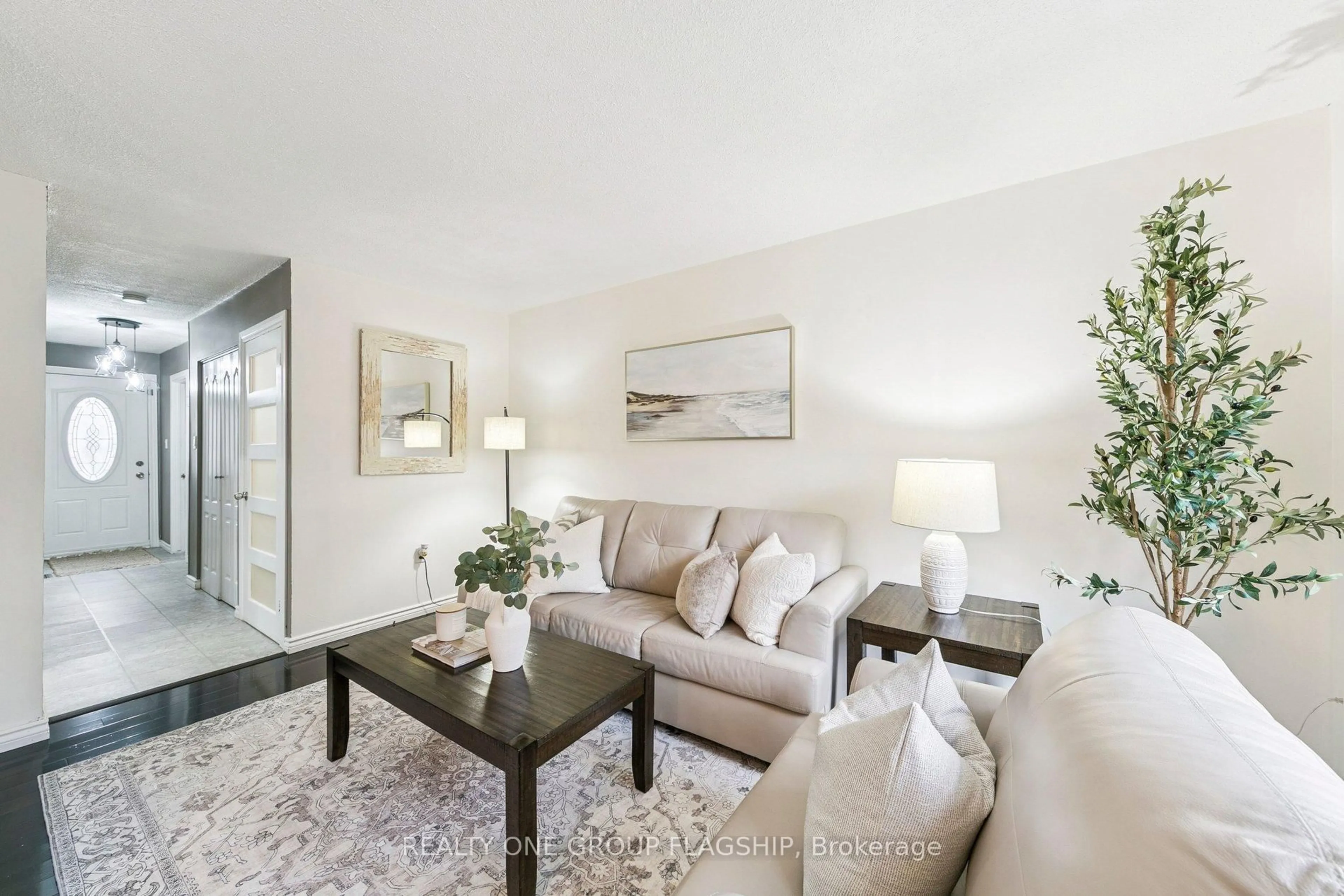 Living room with furniture, unknown for 100 Quigley Rd #137, Hamilton Ontario L8K 6J1