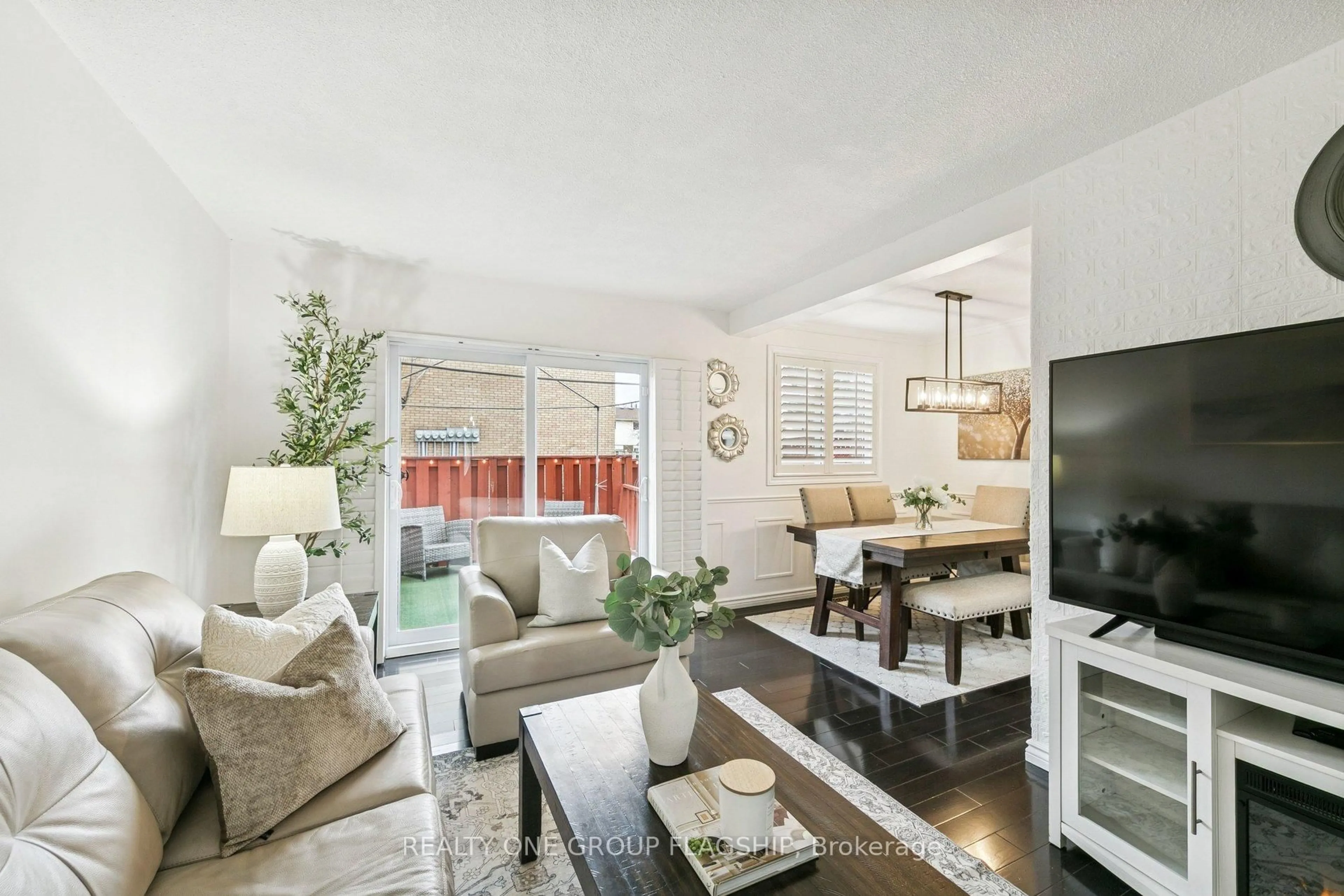 Living room with furniture, unknown for 100 Quigley Rd #137, Hamilton Ontario L8K 6J1