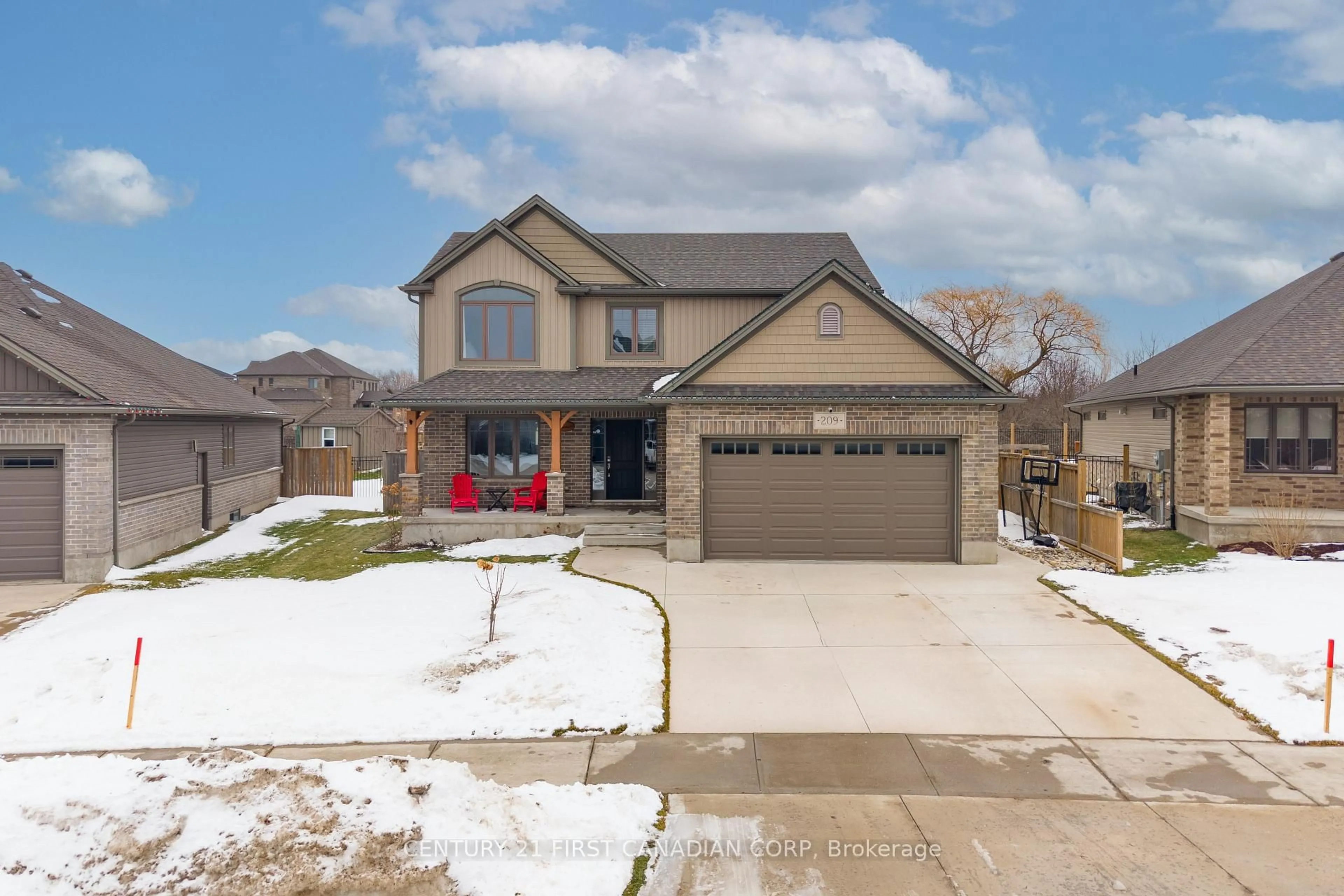 Home with brick exterior material, street for 209 Campanale Way, Lucan Biddulph Ontario N0M 2J0