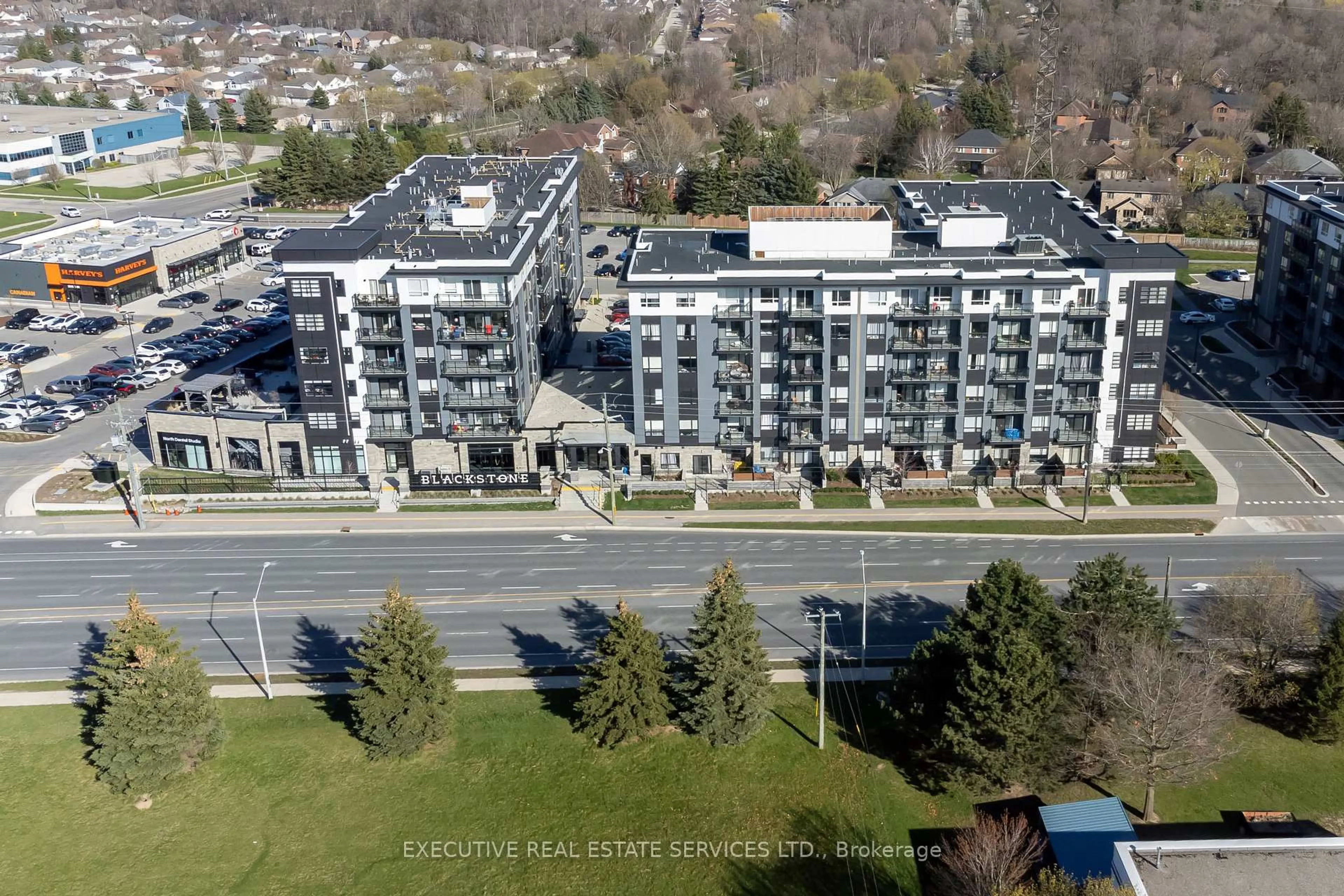 A pic from outside/outdoor area/front of a property/back of a property/a pic from drone, unknown for 251 Northfield Dr #322, Waterloo Ontario N2K 0G9