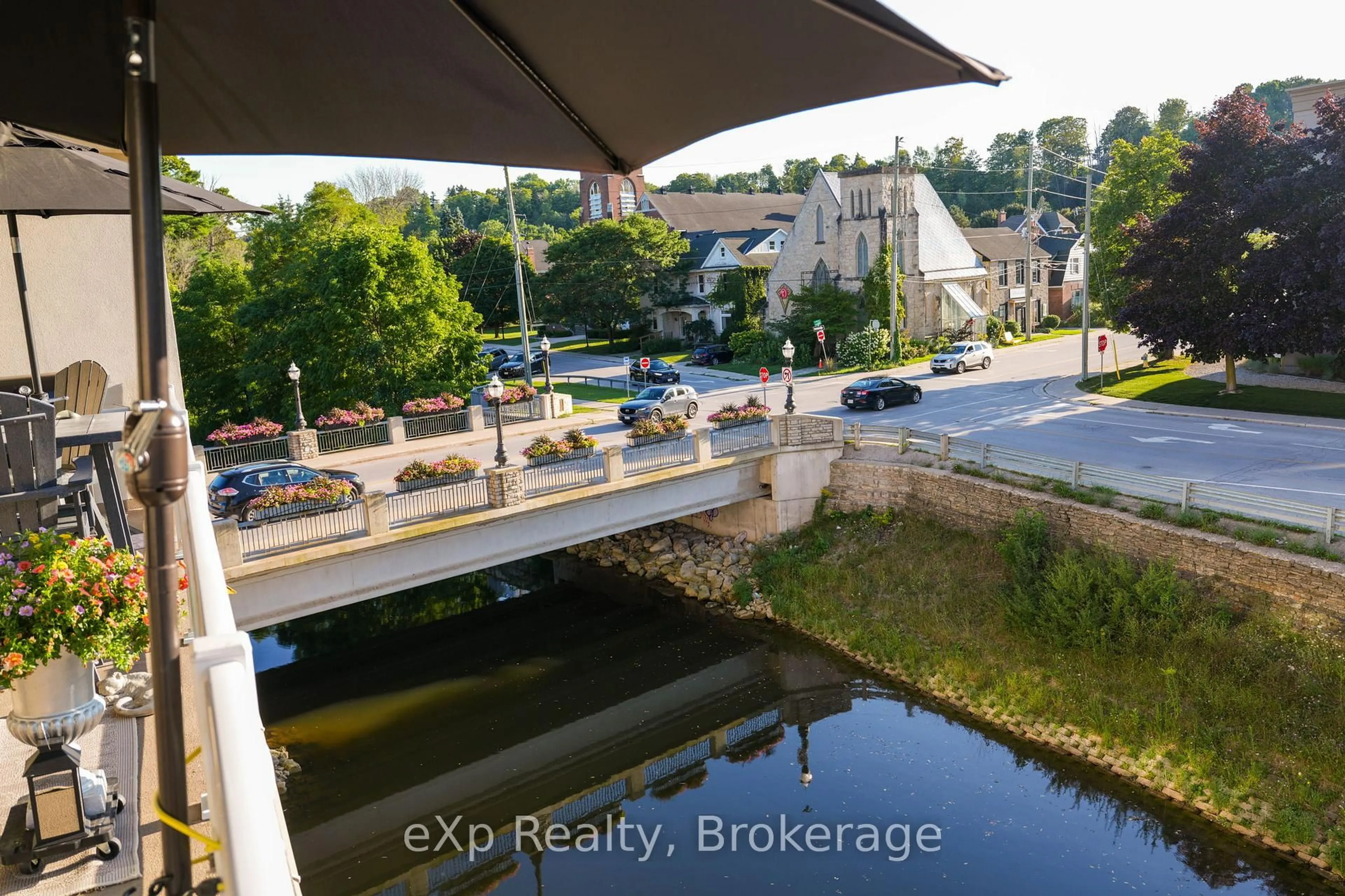 A pic from outside/outdoor area/front of a property/back of a property/a pic from drone, water/lake/river/ocean view for 80 9th St #203, Owen Sound Ontario N4K 1N4