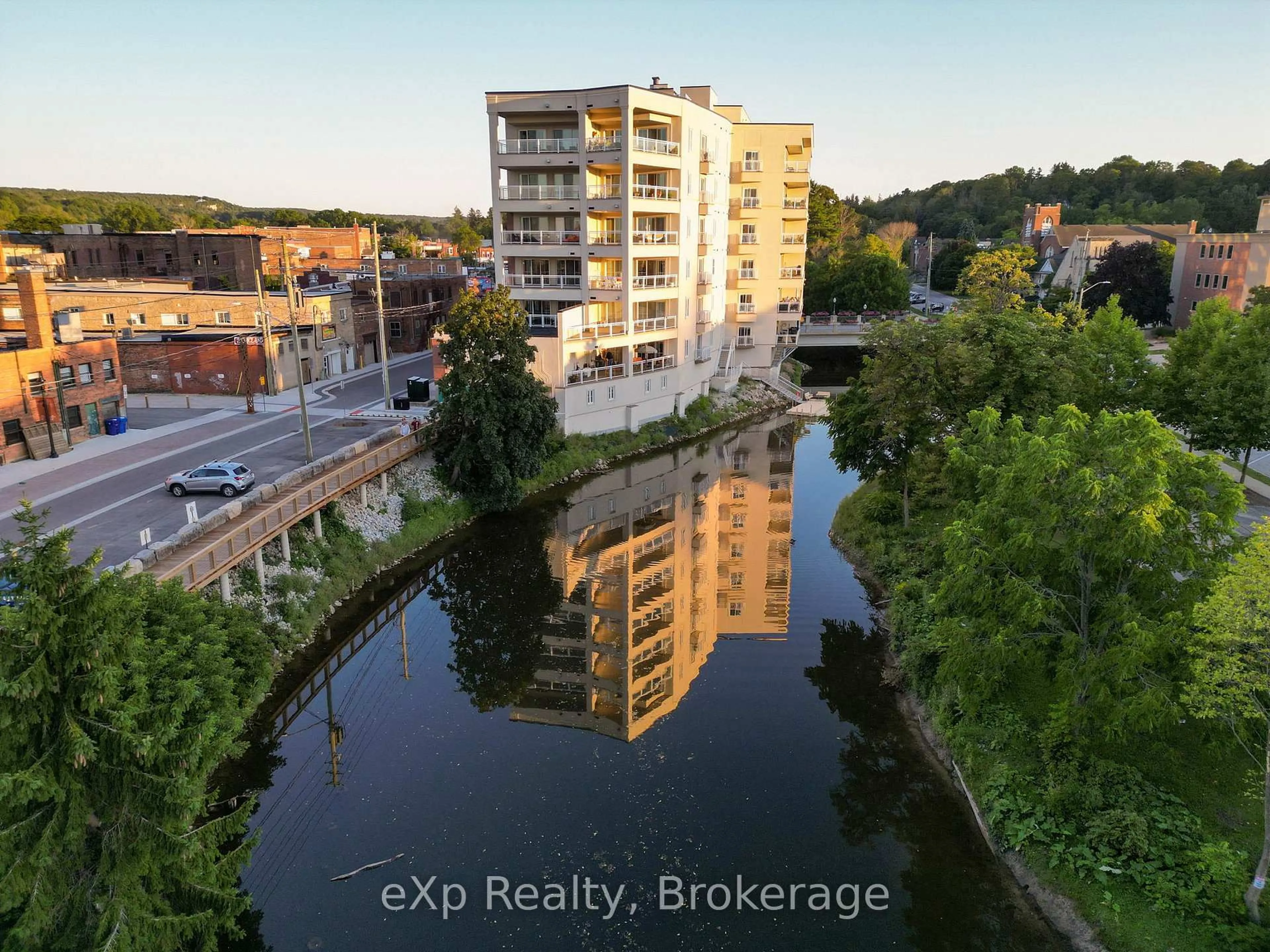 A pic from outside/outdoor area/front of a property/back of a property/a pic from drone, water/lake/river/ocean view for 80 9th St #203, Owen Sound Ontario N4K 1N4
