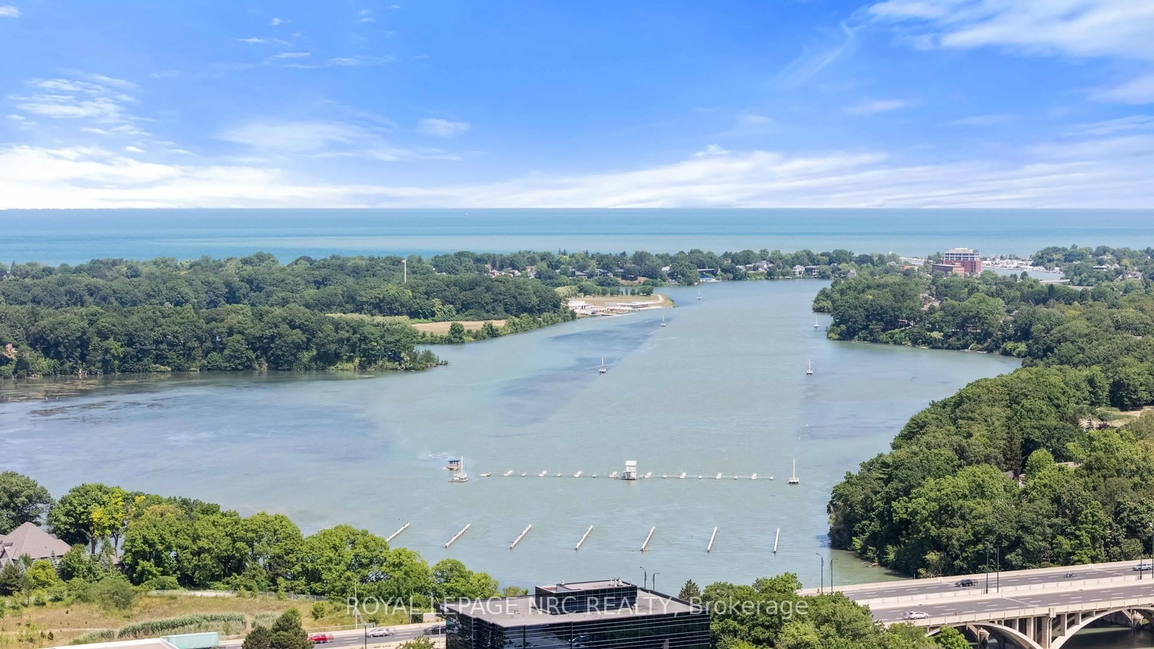 A pic from outside/outdoor area/front of a property/back of a property/a pic from drone, water/lake/river/ocean view for 162 Martindale Rd #605, St. Catharines Ontario L2S 3S4