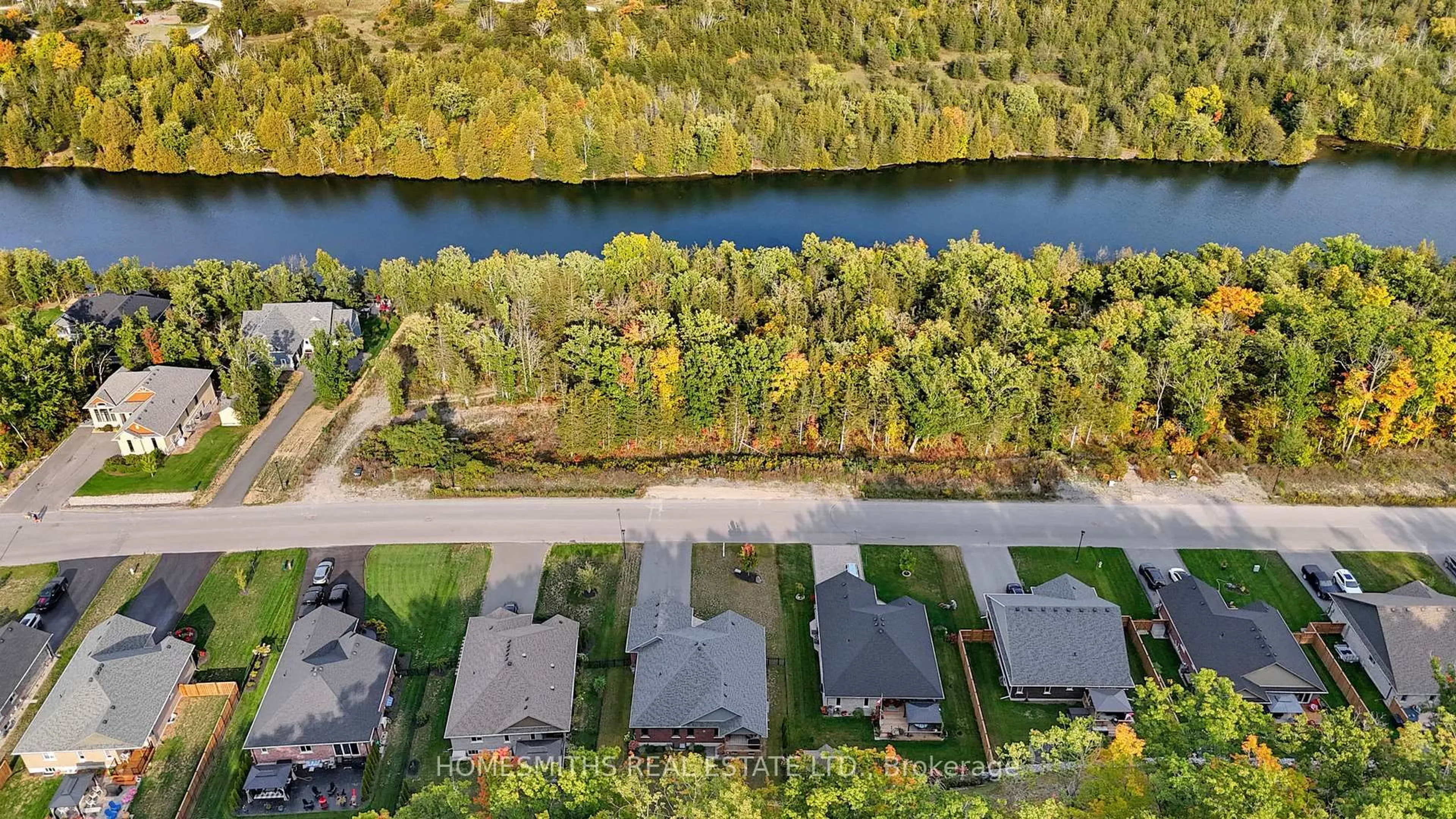 A pic from outside/outdoor area/front of a property/back of a property/a pic from drone, water/lake/river/ocean view for 12 Riverside Tr, Trent Hills Ontario K0L 1L0