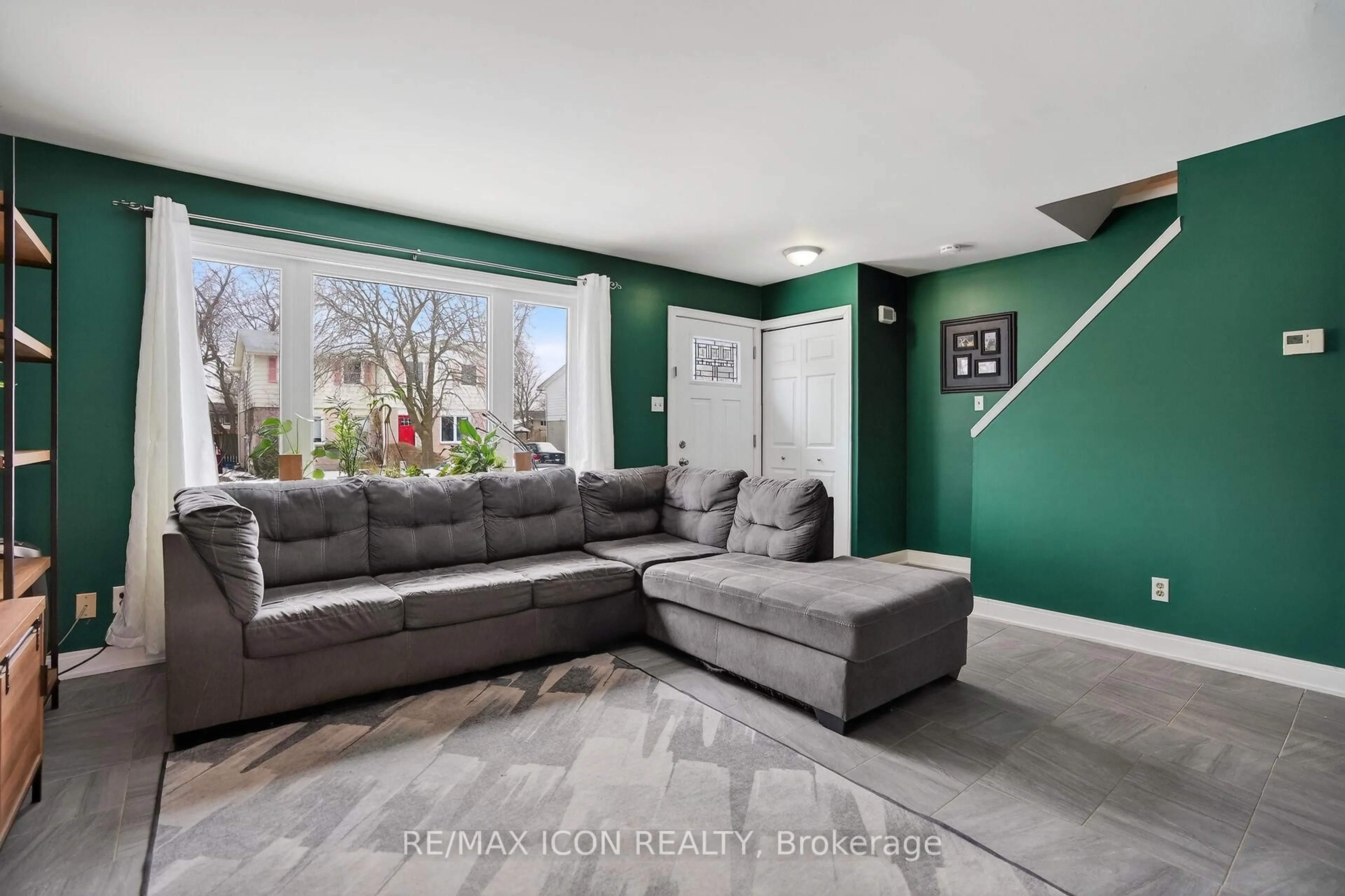 Living room with furniture, ceramic/tile floor for 26 Rosamond Cres, London South Ontario N6E 2M8