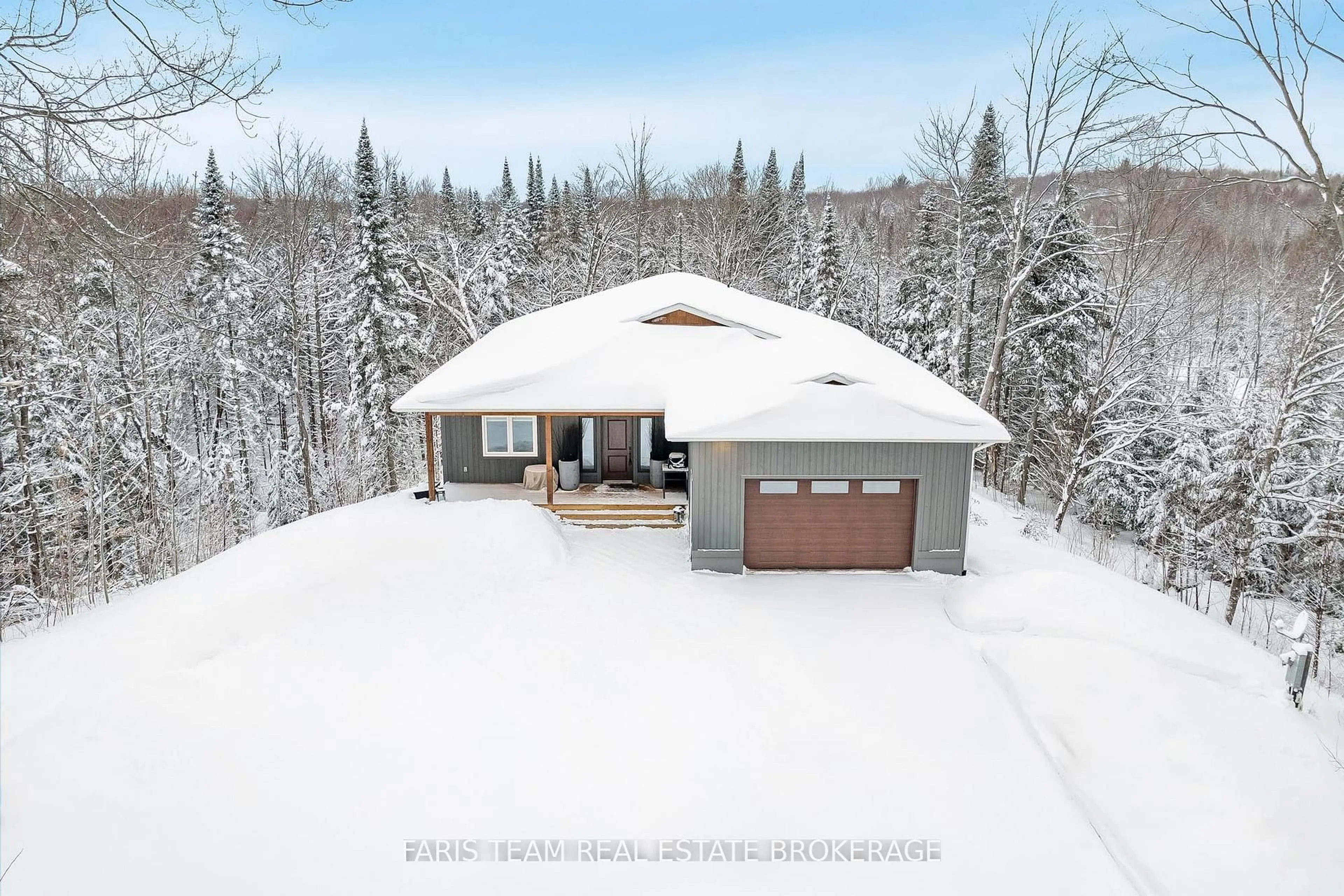 A pic from outside/outdoor area/front of a property/back of a property/a pic from drone, unknown for 298 Yearley Rd, Huntsville Ontario P0B 1M0
