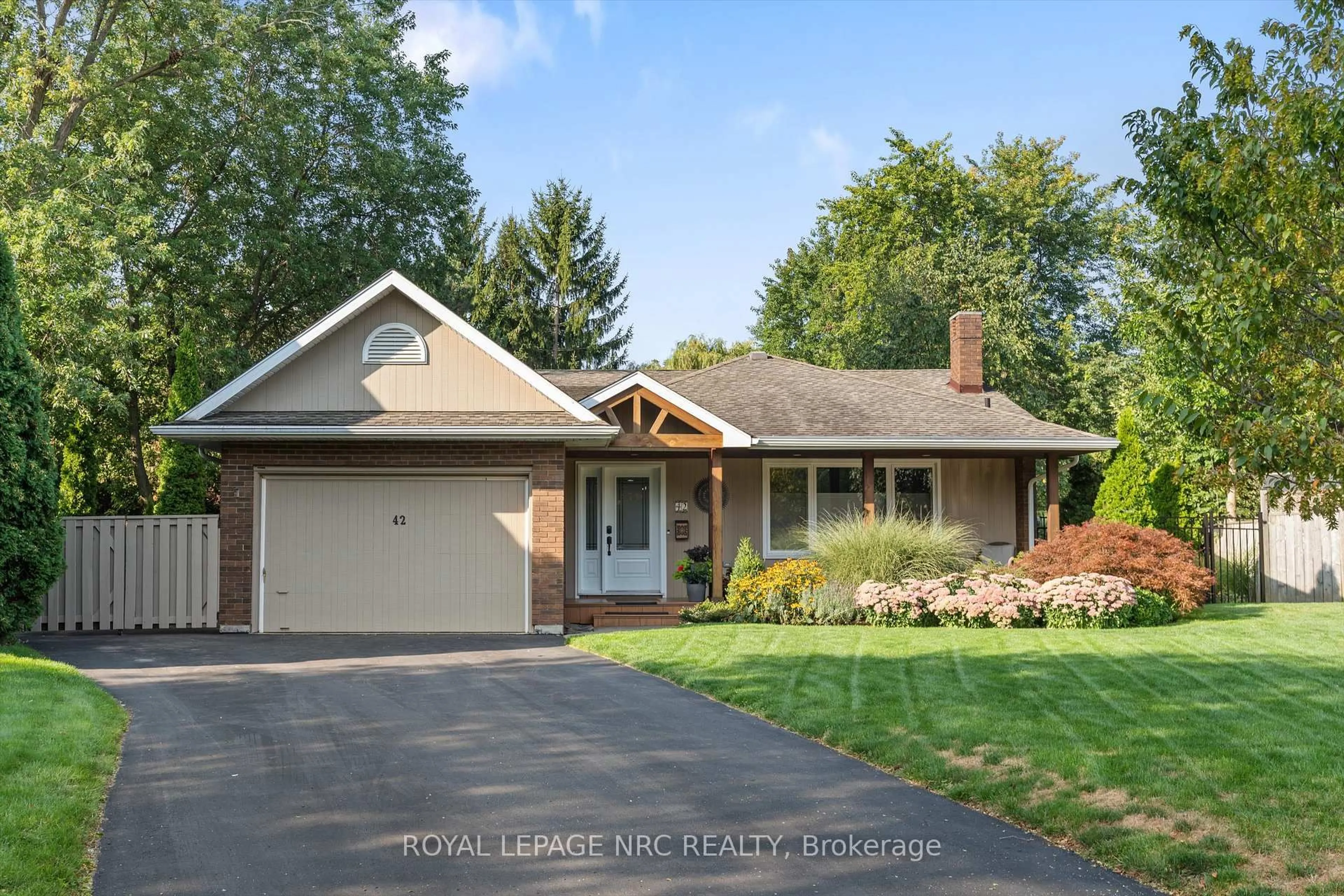 Home with brick exterior material, street for 42 The Cedars, St. Catharines Ontario L2M 6M8