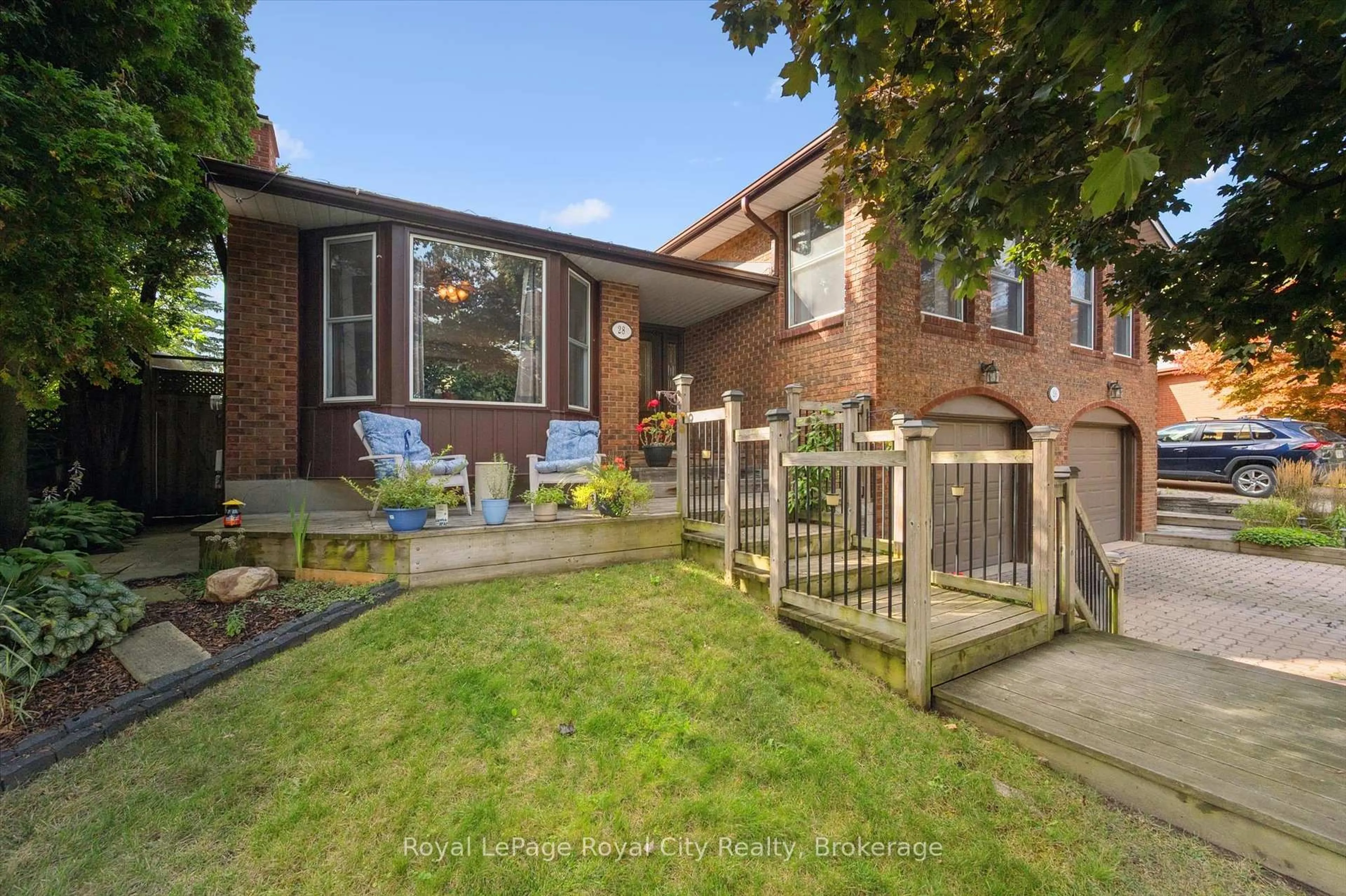 A pic from outside/outdoor area/front of a property/back of a property/a pic from drone, street for 28 Wimbledon Rd, Guelph Ontario N1H 7N1