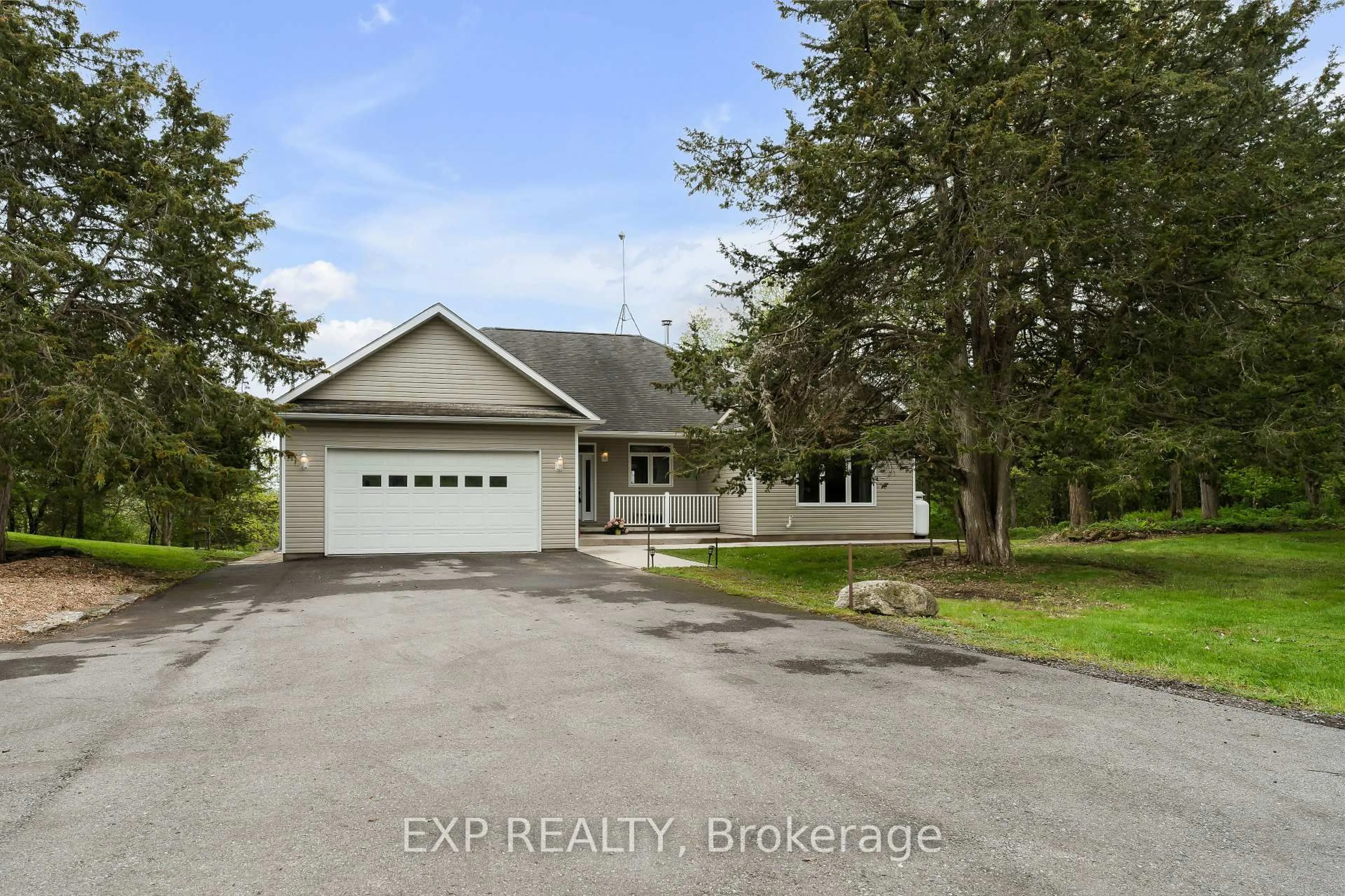 A pic from outside/outdoor area/front of a property/back of a property/a pic from drone, street for 4739 County Rd 9 Rd, Napanee Ontario K7R 3K8