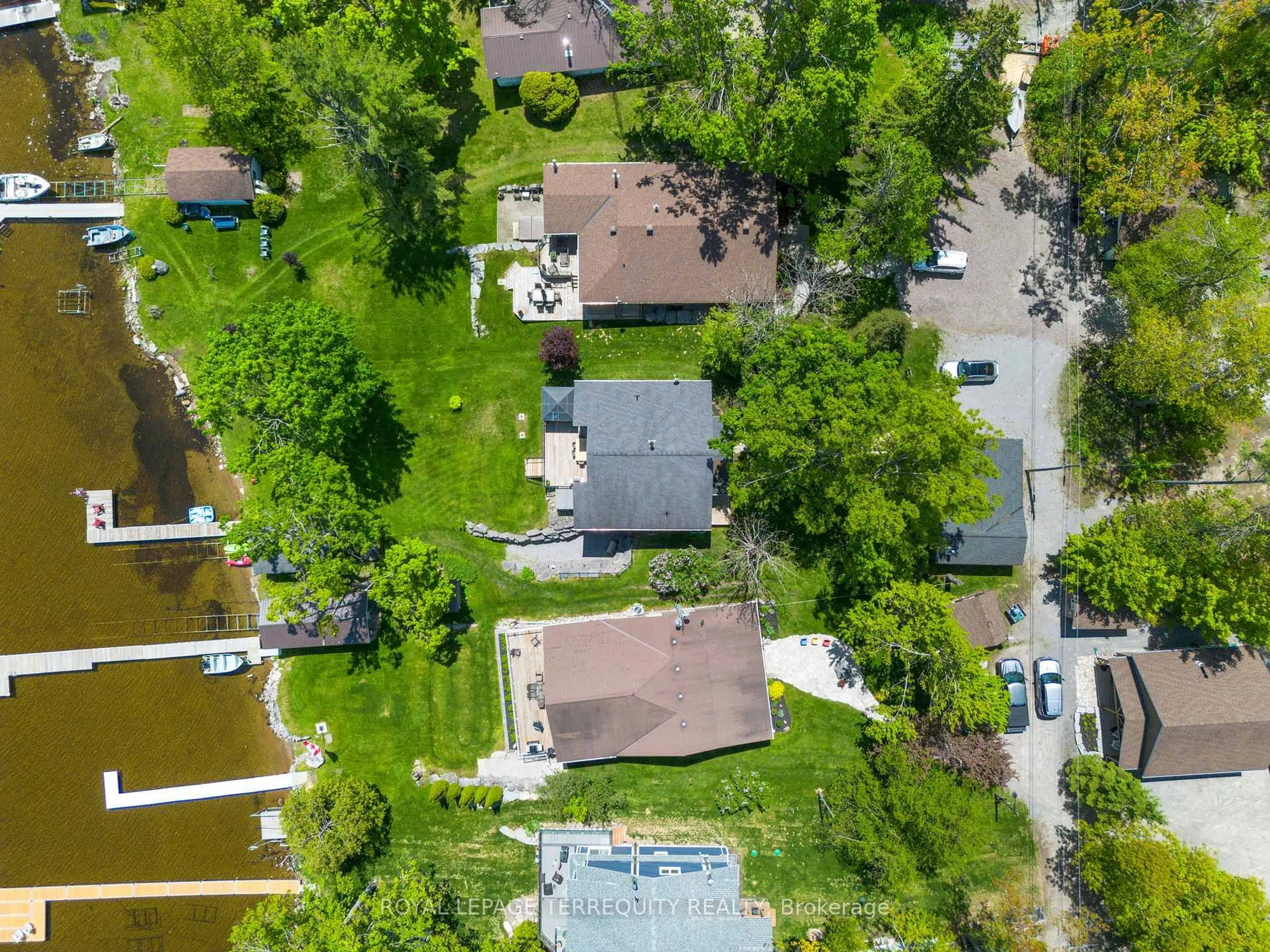 A pic from outside/outdoor area/front of a property/back of a property/a pic from drone, street for 18 Miller Rd, Kawartha Lakes Ontario K0M 1N0