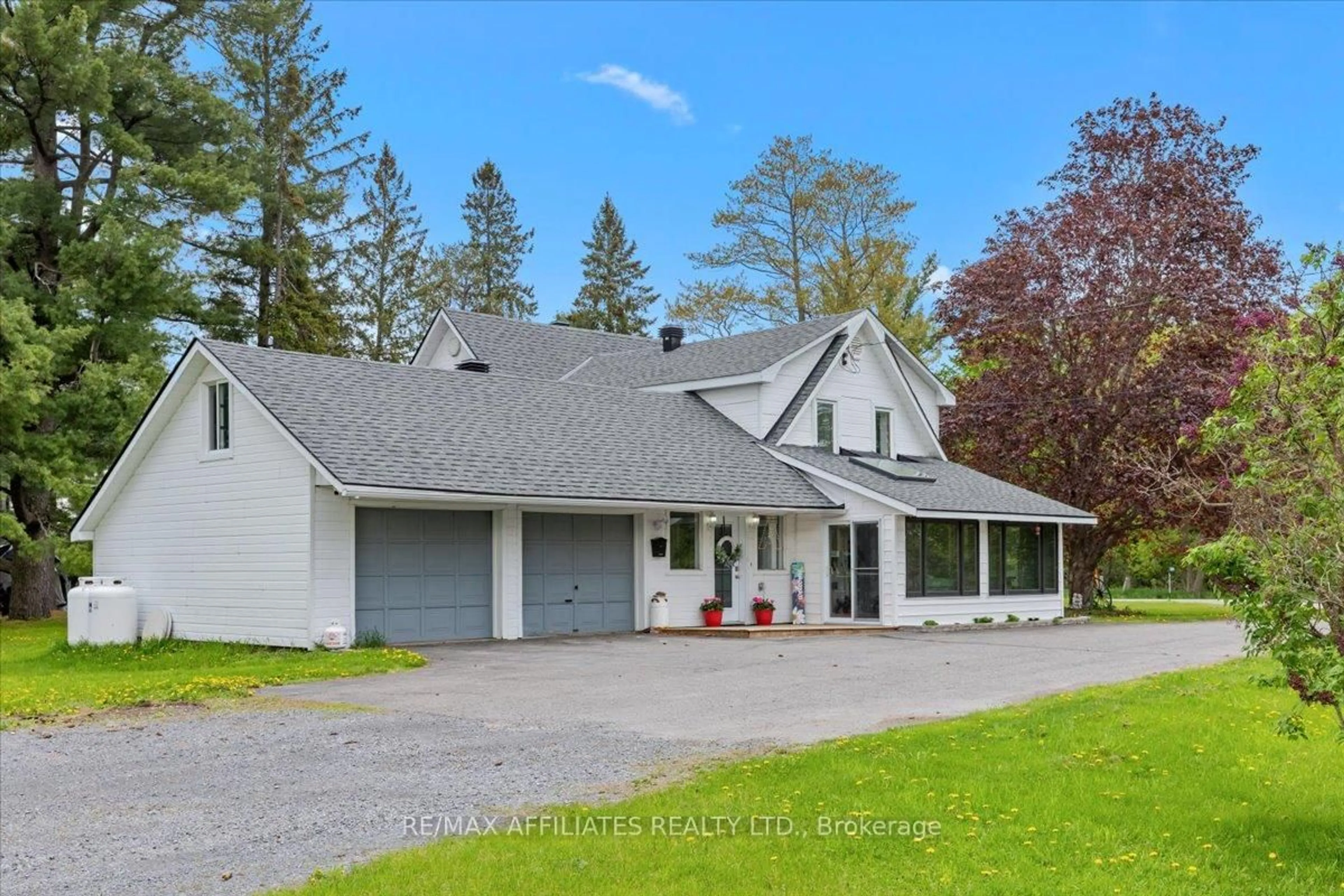 A pic from outside/outdoor area/front of a property/back of a property/a pic from drone, street for 5348 Dunning Rd, Navan Ontario K4B 1J1