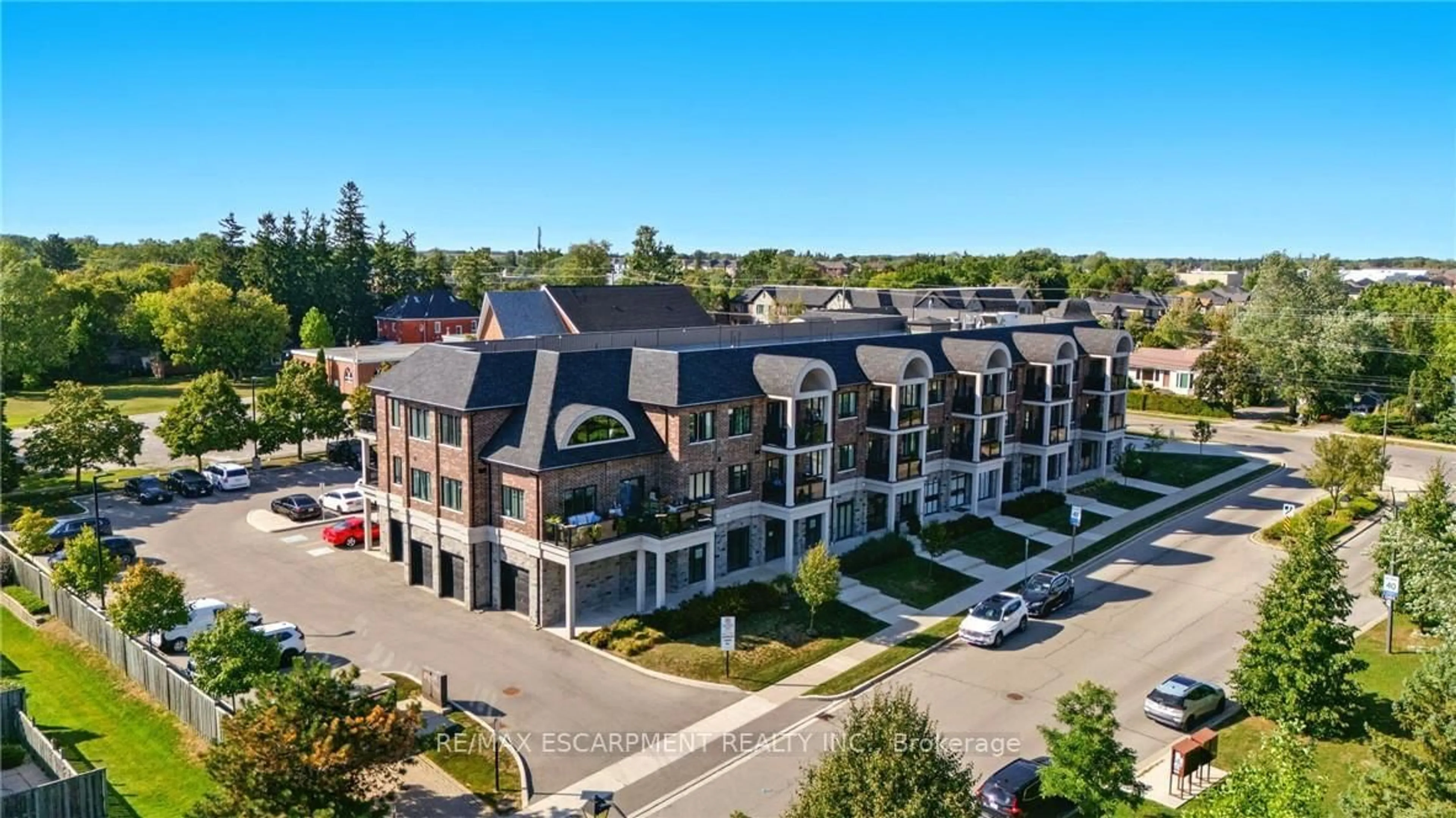 A pic from outside/outdoor area/front of a property/back of a property/a pic from drone, street for 2605 BINBROOK Rd #211, Hamilton Ontario L0R 1C0