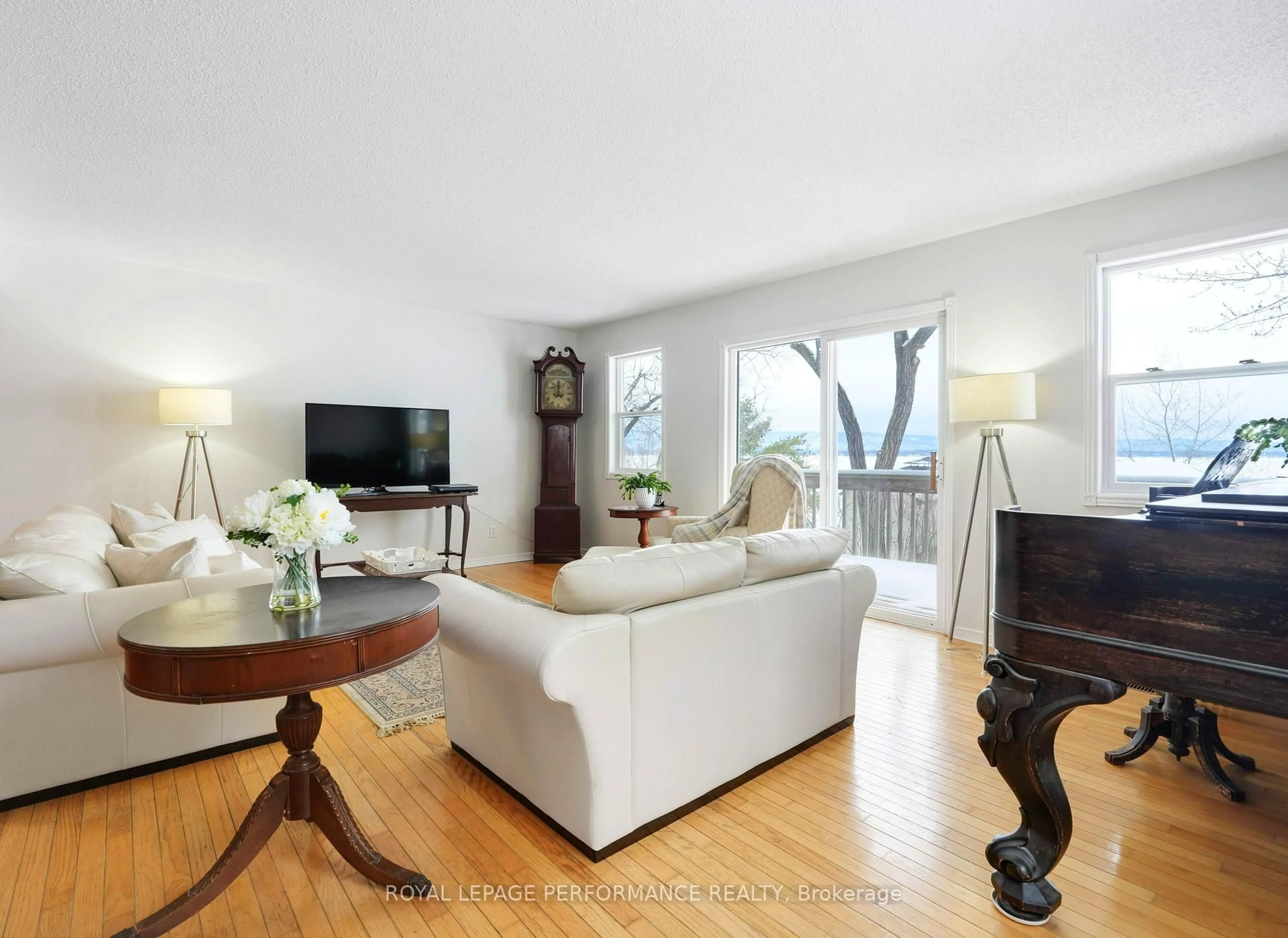 Living room with furniture, wood/laminate floor for 326 Bayview Dr, Ottawa Ontario K0A 3M0