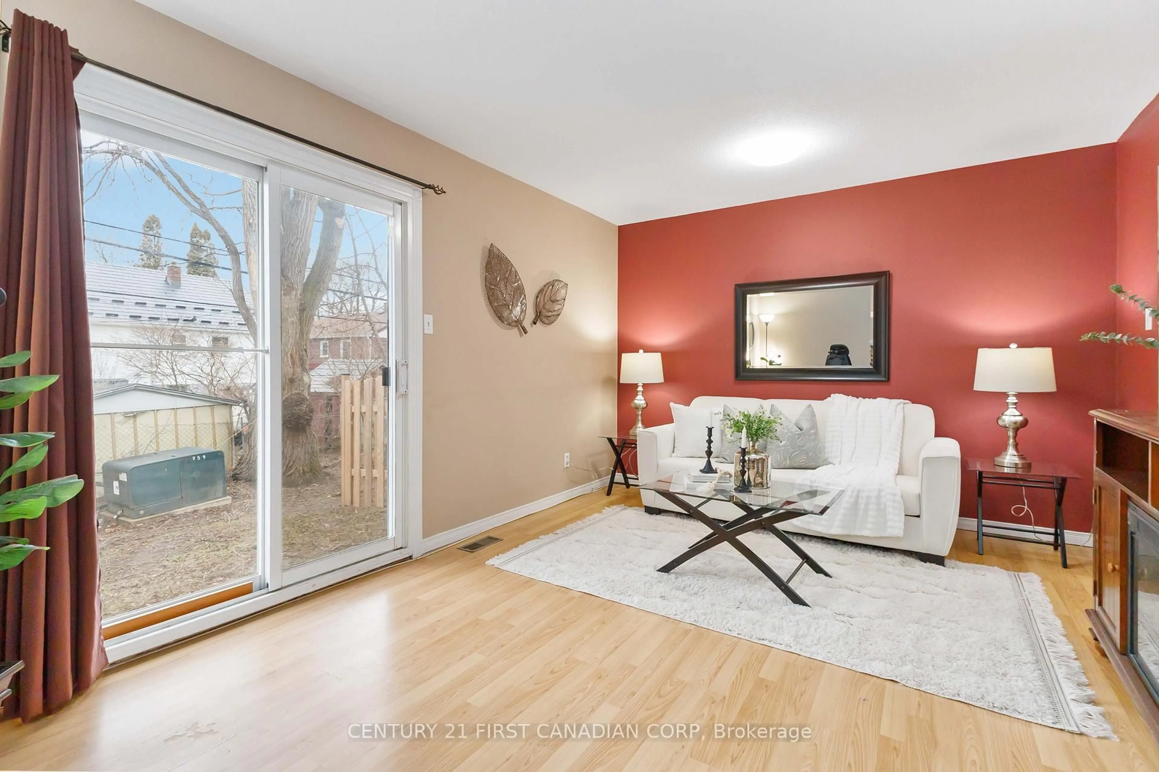 Living room with furniture, wood/laminate floor for 165 Boullee St #7, London East Ontario N5Y 1T9