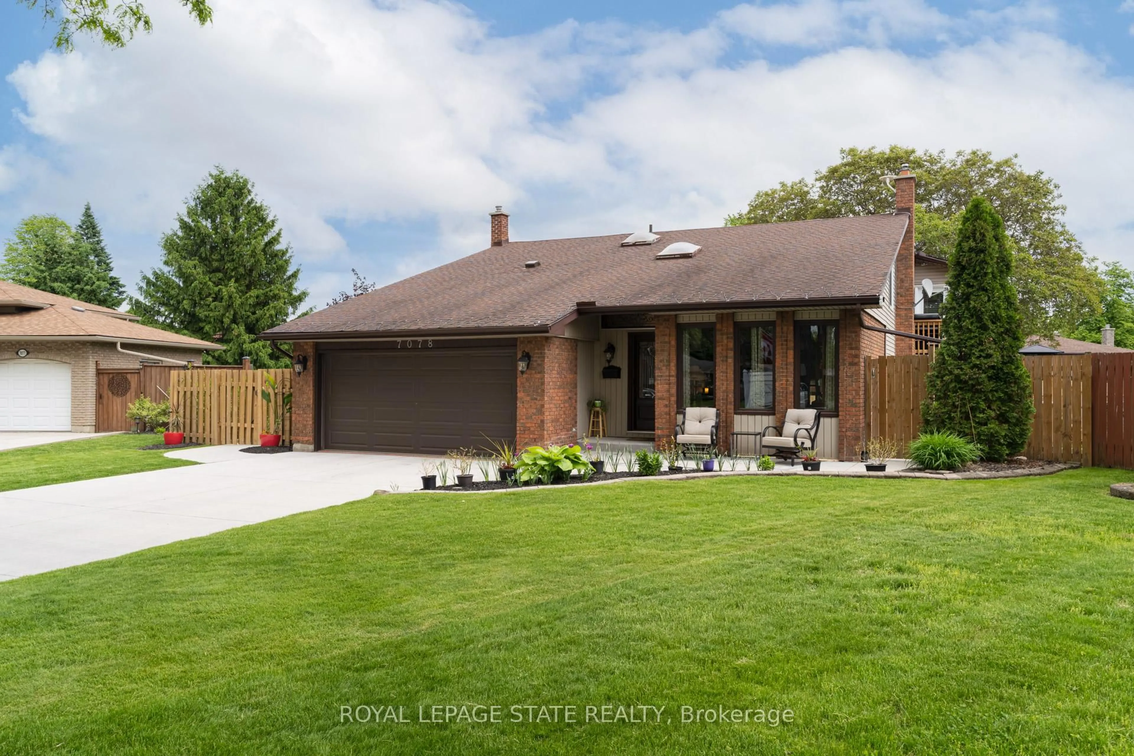 Home with brick exterior material, street for 7078 Rosseau Pl, Niagara Falls Ontario L2J 3V2