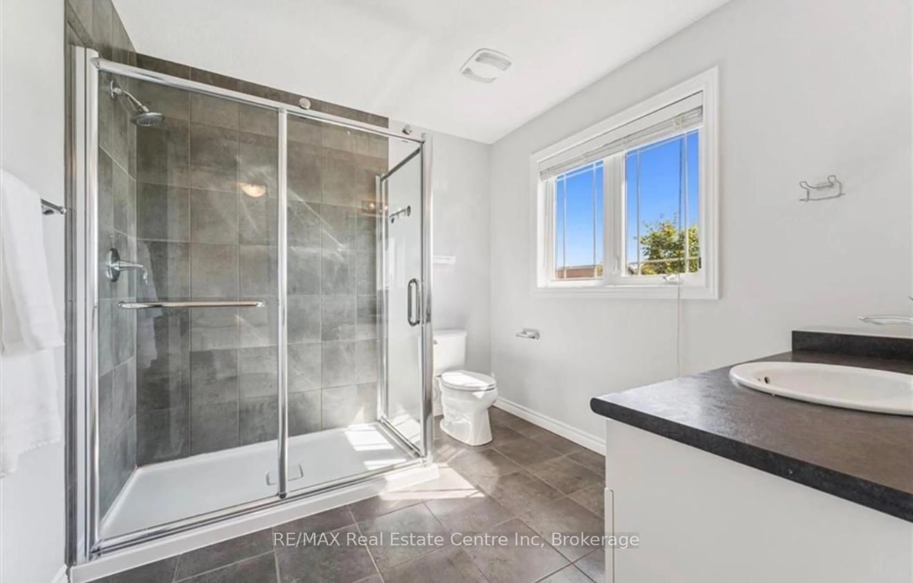 Contemporary bathroom, ceramic/tile floor for 158 Kemp Cres, Guelph Ontario N1E 0K1