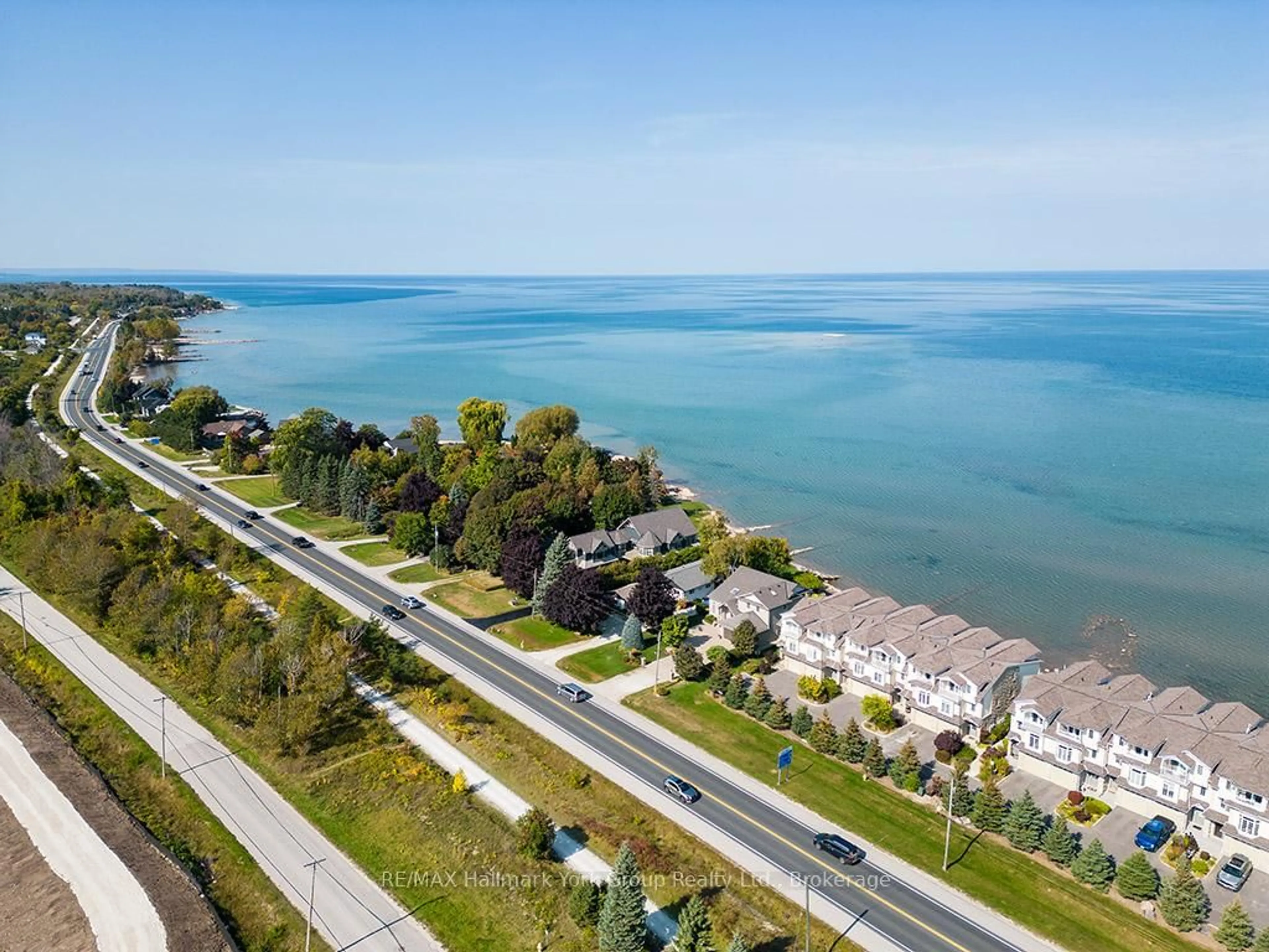 A pic from outside/outdoor area/front of a property/back of a property/a pic from drone, water/lake/river/ocean view for 209707 HWY 26 #5, Blue Mountains Ontario L9Y 0T8