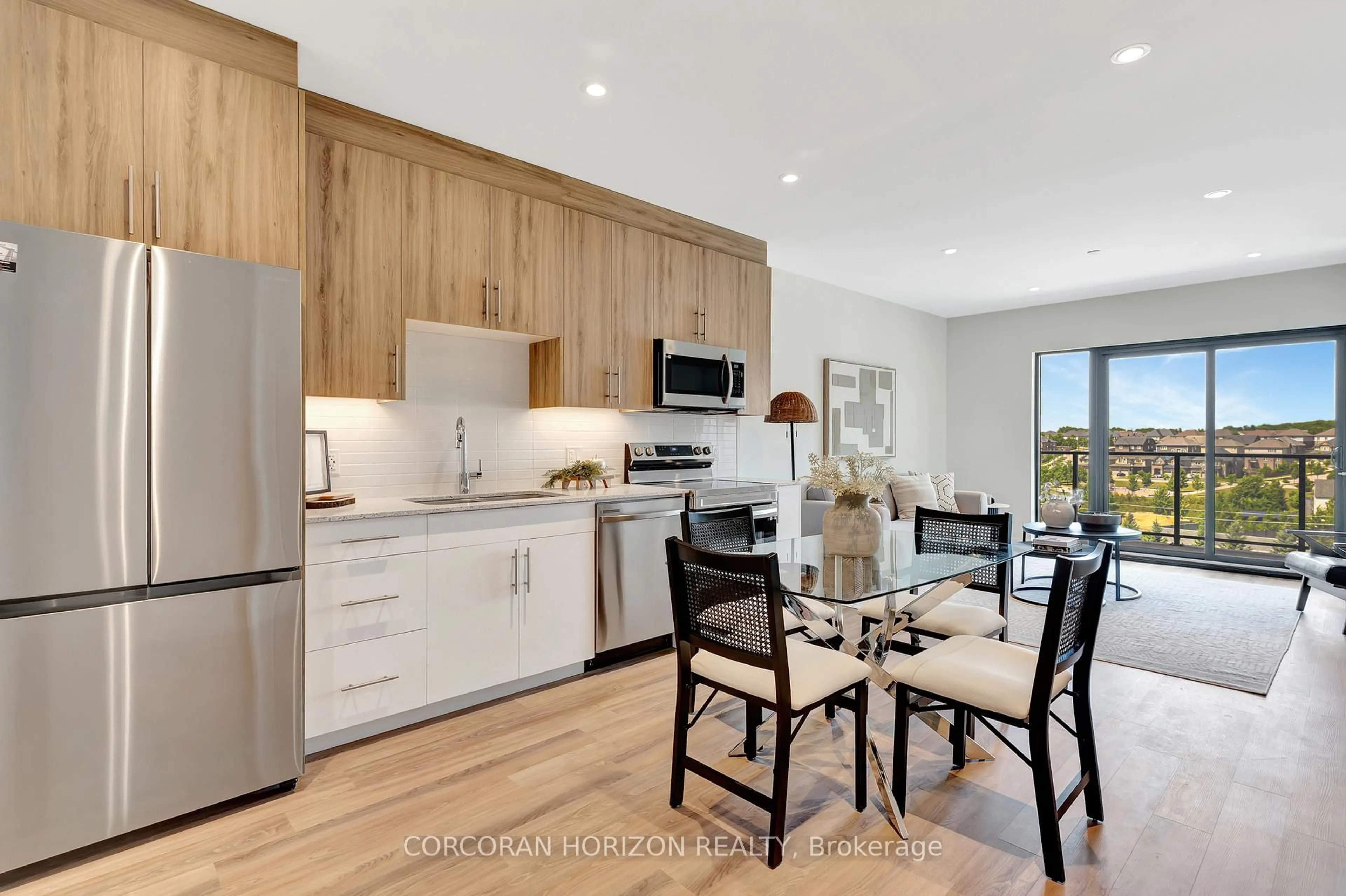 Open concept kitchen, wood/laminate floor for 525 New Dundee Rd #706, Kitchener Ontario N2P 0K8