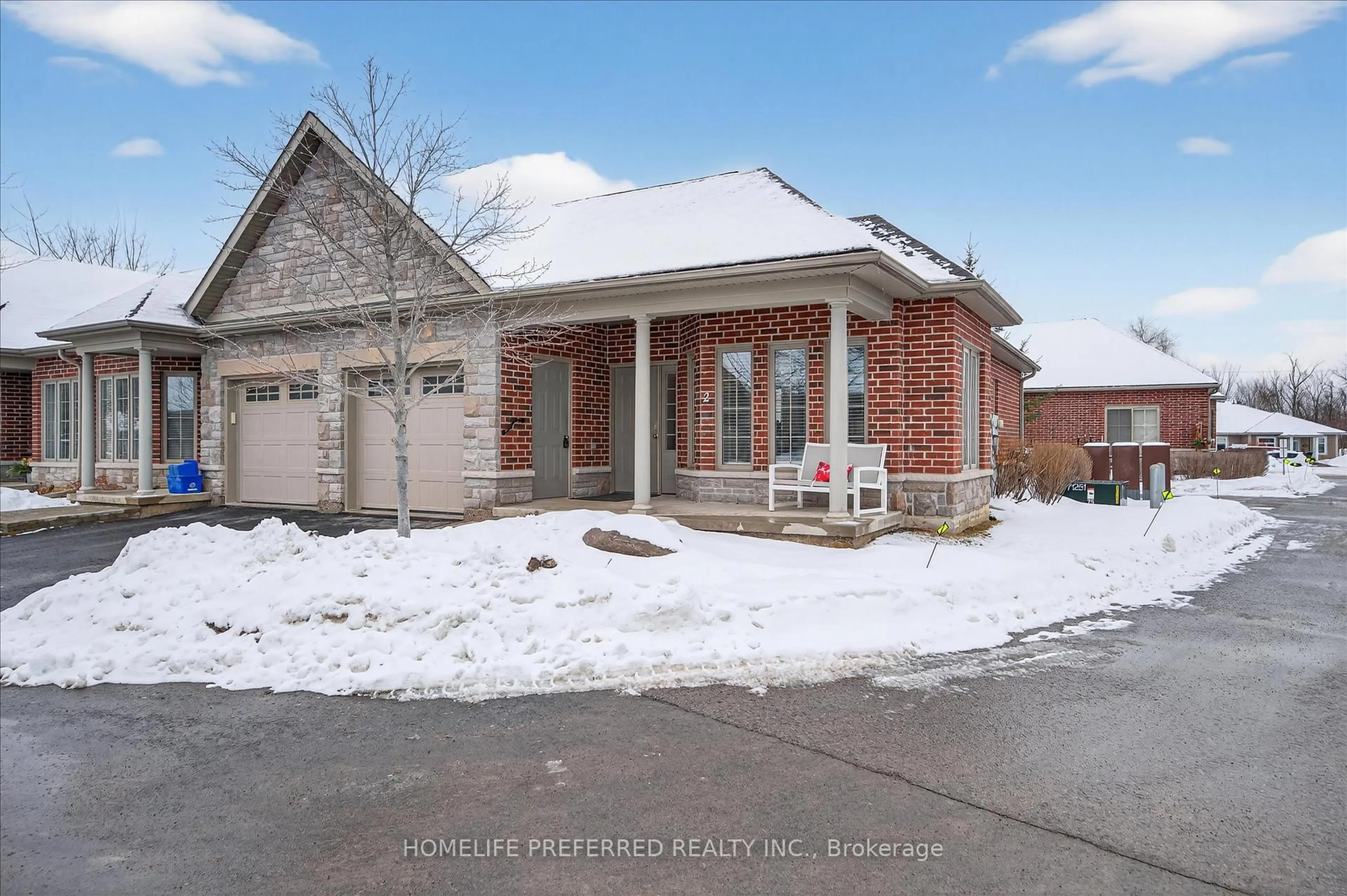 Home with brick exterior material, street for 2 Calberry Crt, Selwyn Ontario K0L 2H0