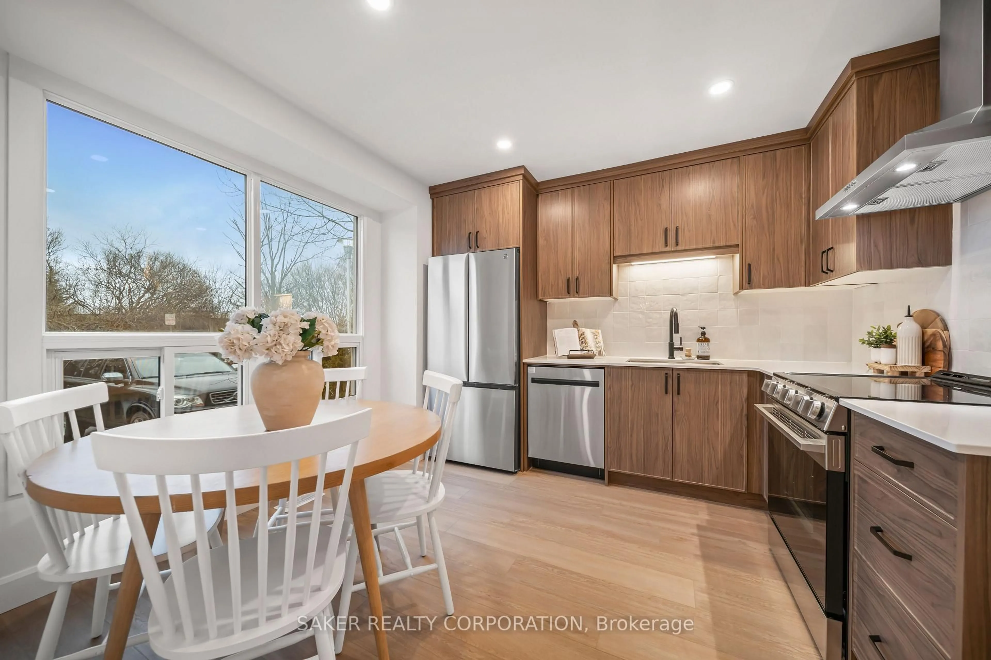 Open concept kitchen, wood/laminate floor for 135 Belmont Dr #17, London South Ontario N6J 4J3