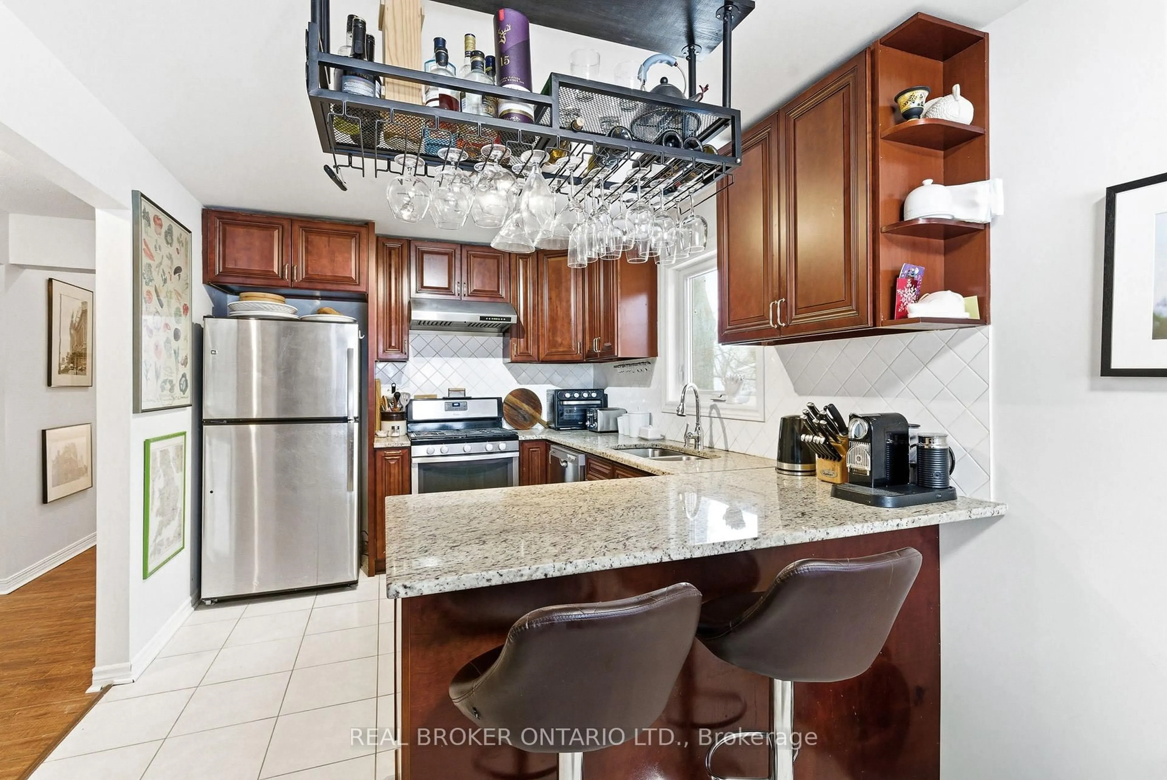 Open concept kitchen, ceramic/tile floor for 851 Rob Roy Ave, Ottawa Ontario K2B 8S6