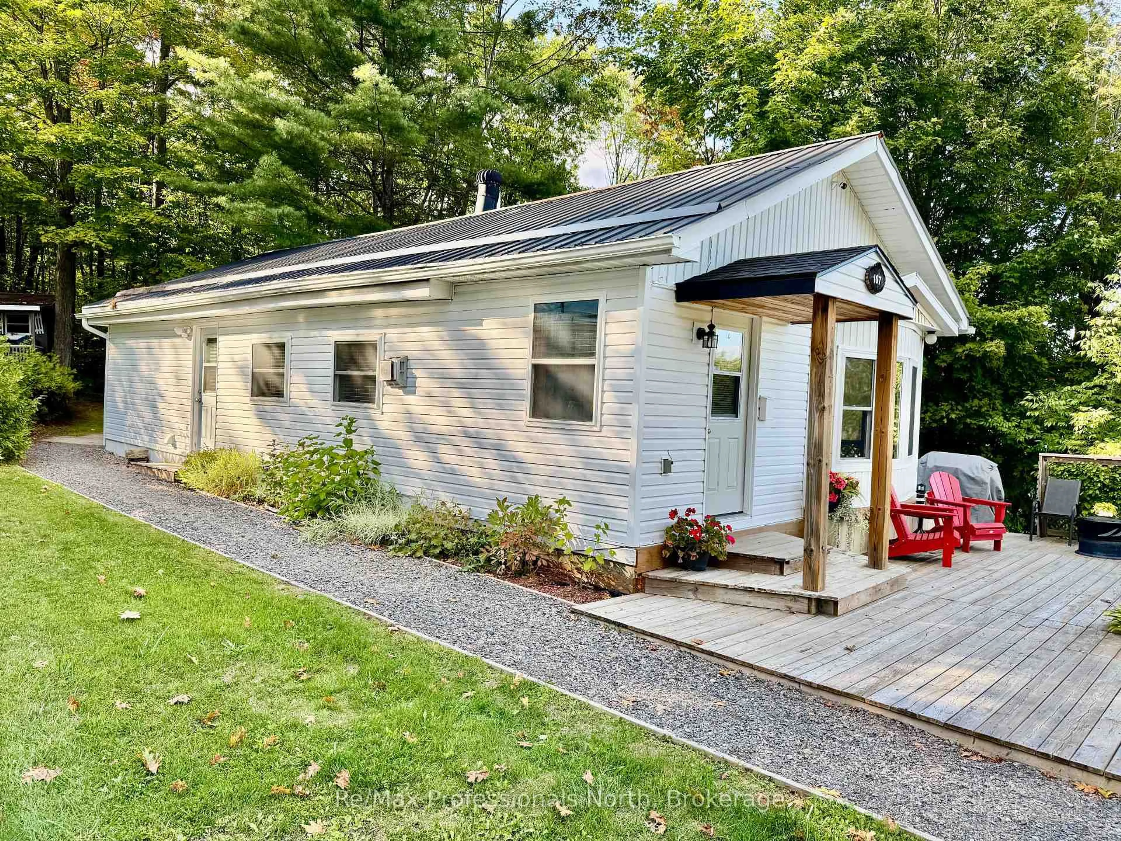 Home with vinyl exterior material, street for 1007 Racoon Rd #107, Gravenhurst Ontario P1P 0C4