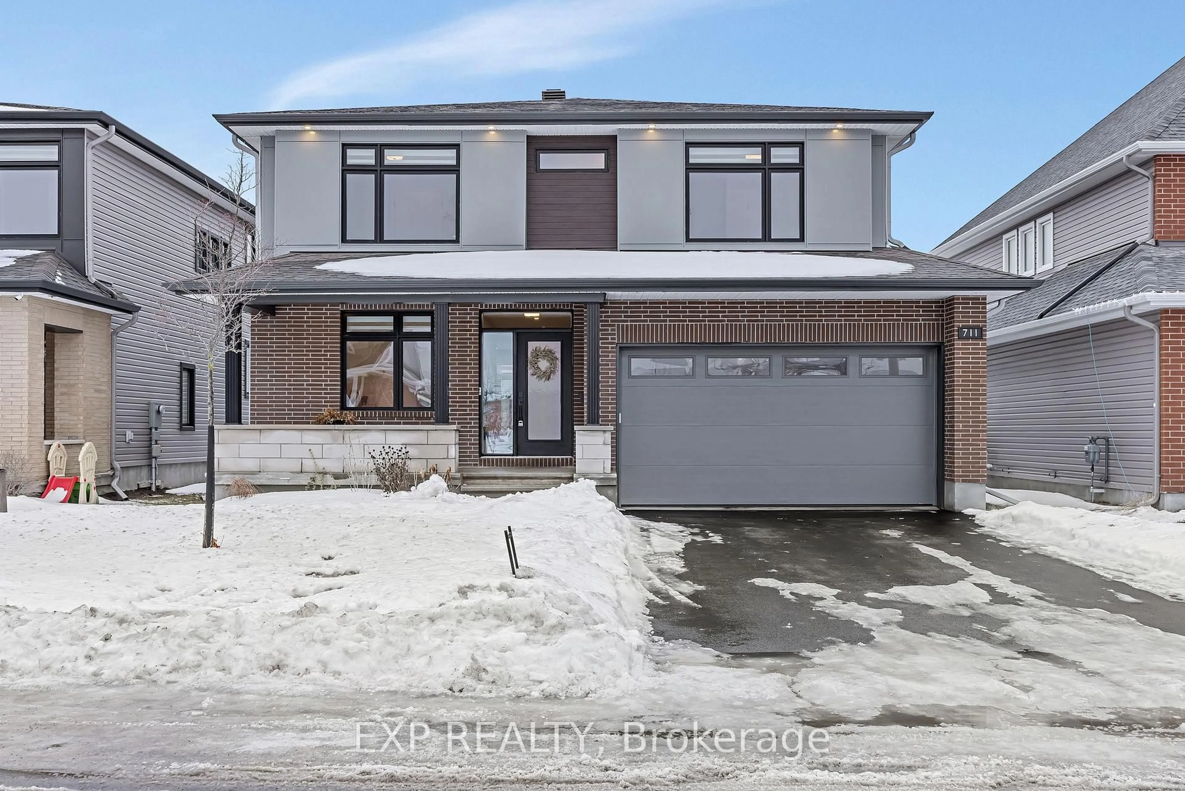 Home with brick exterior material, street for 711 Moonflower Cres, Ottawa Ontario K1T 0X8