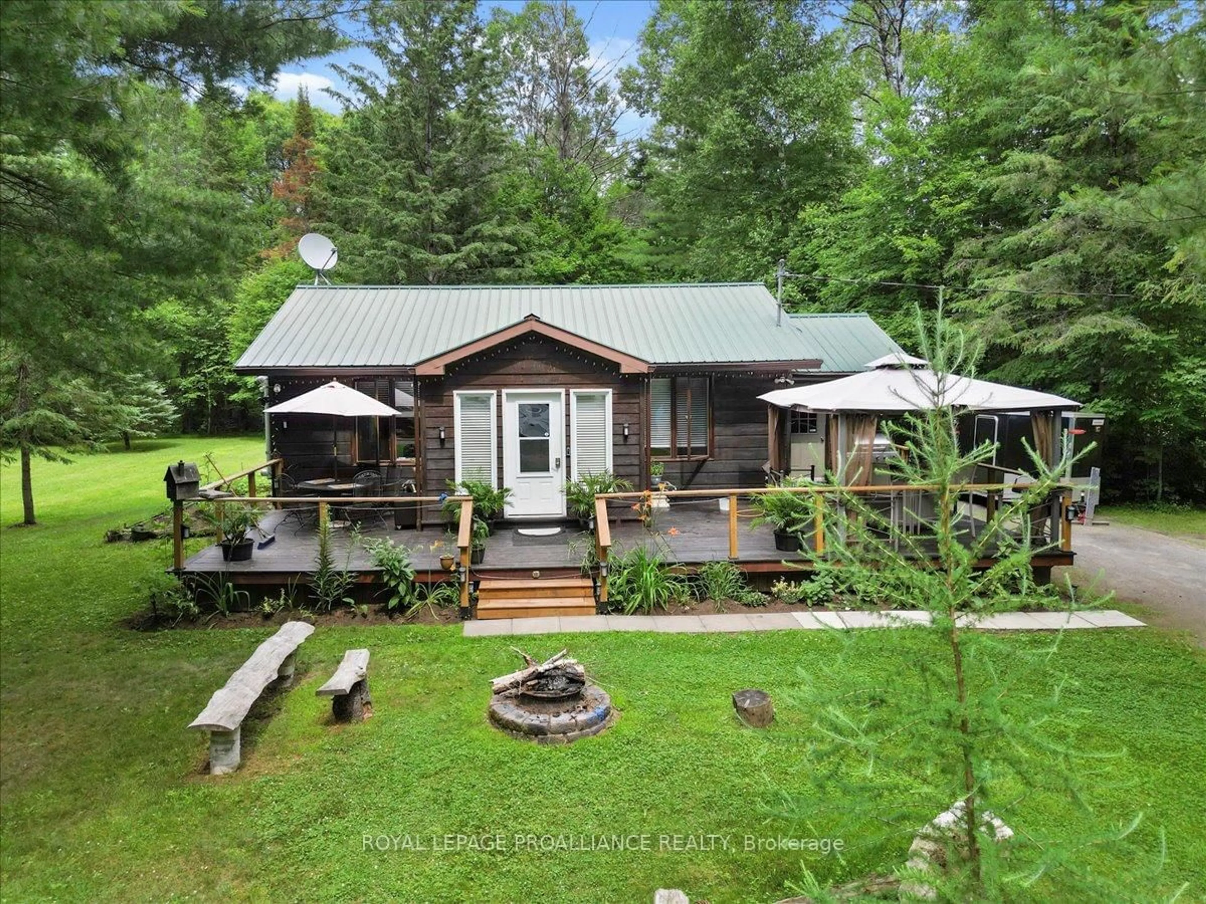 A pic from outside/outdoor area/front of a property/back of a property/a pic from drone, forest/trees view for 1151 Harlowe Road, R.R. #1, Frontenac Ontario K0H 2G0