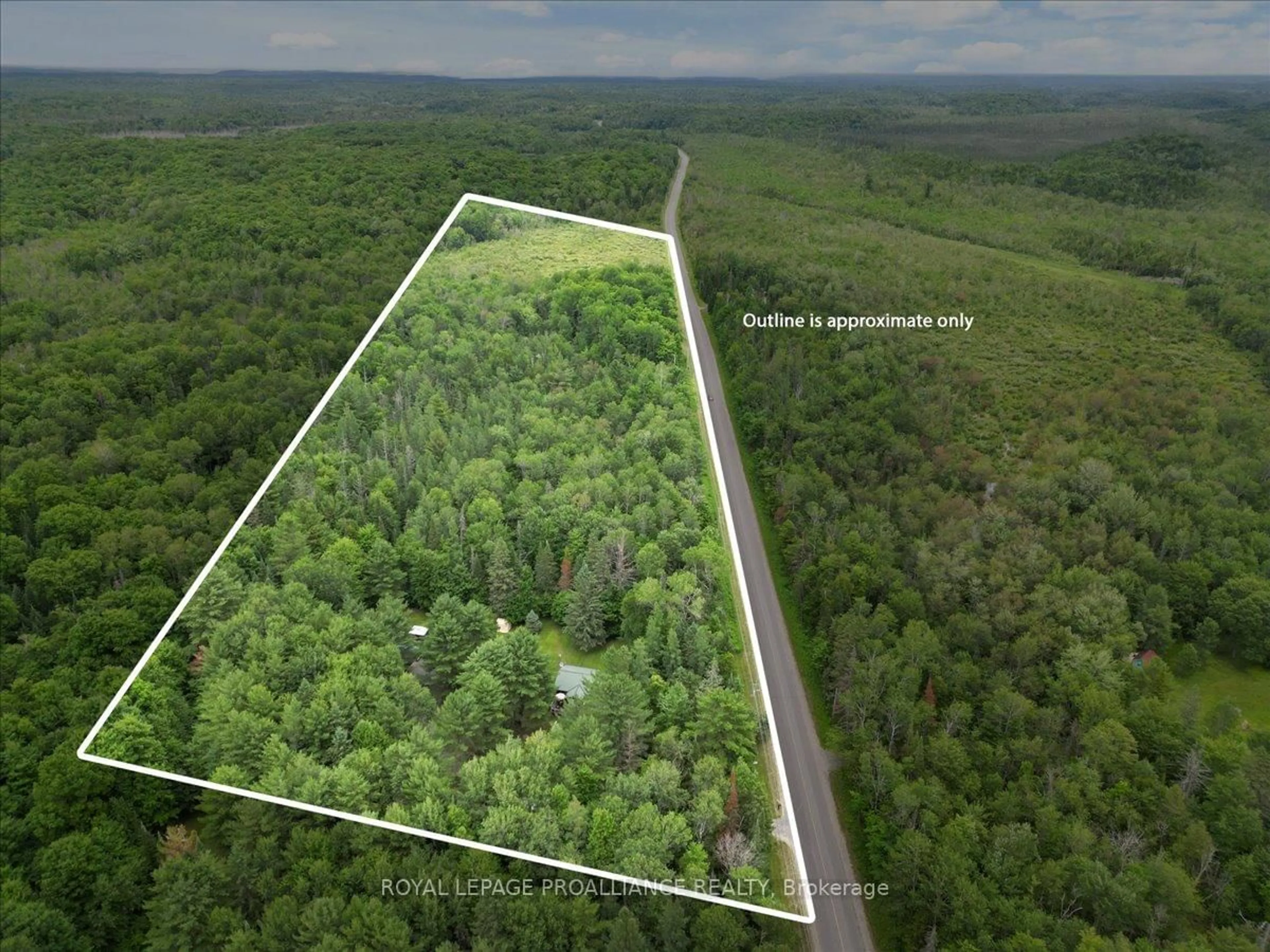 A pic from outside/outdoor area/front of a property/back of a property/a pic from drone, forest/trees view for 1151 Harlowe Road, R.R. #1, Frontenac Ontario K0H 2G0