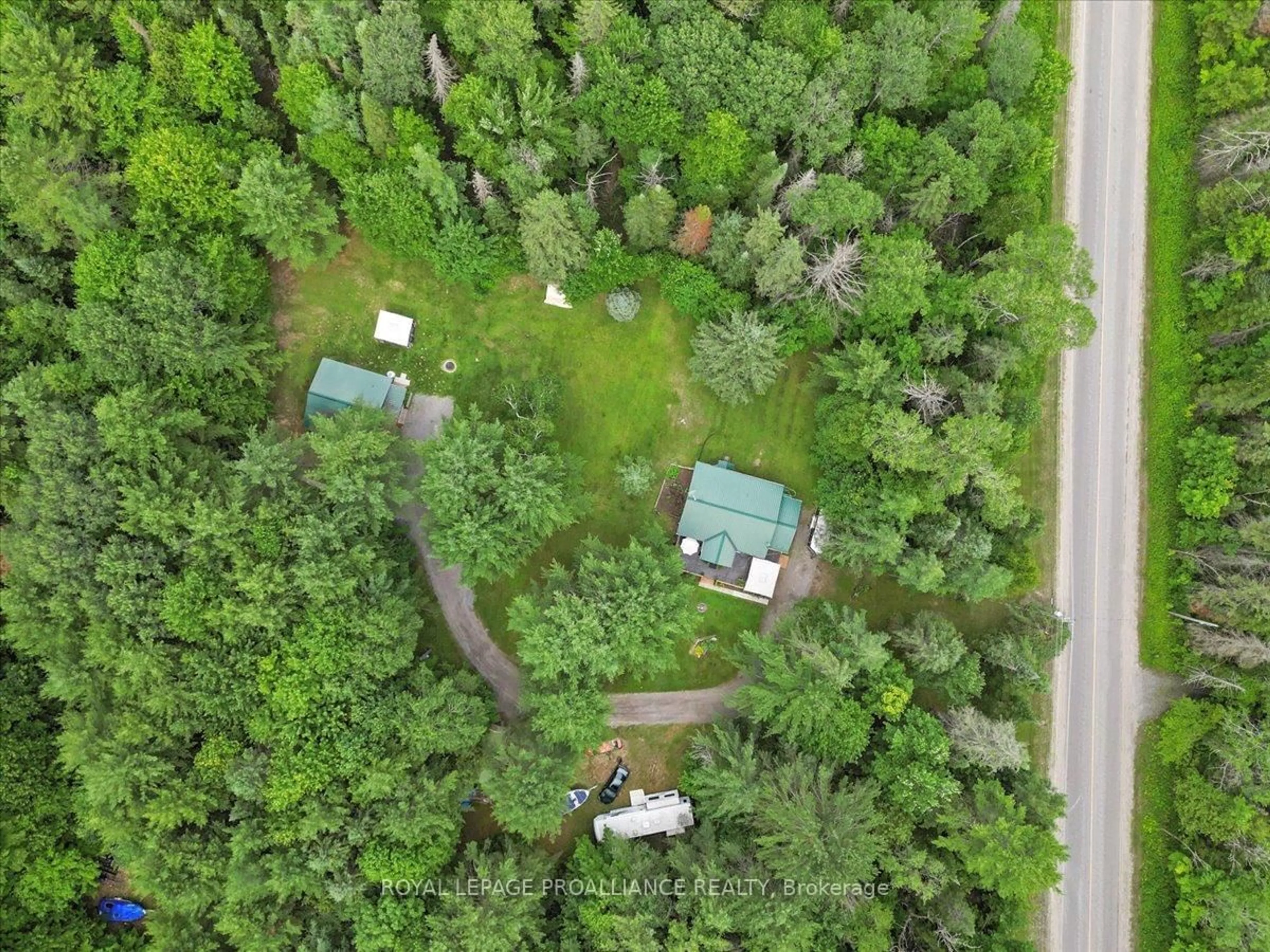 A pic from outside/outdoor area/front of a property/back of a property/a pic from drone, forest/trees view for 1151 Harlowe Road, R.R. #1, Frontenac Ontario K0H 2G0