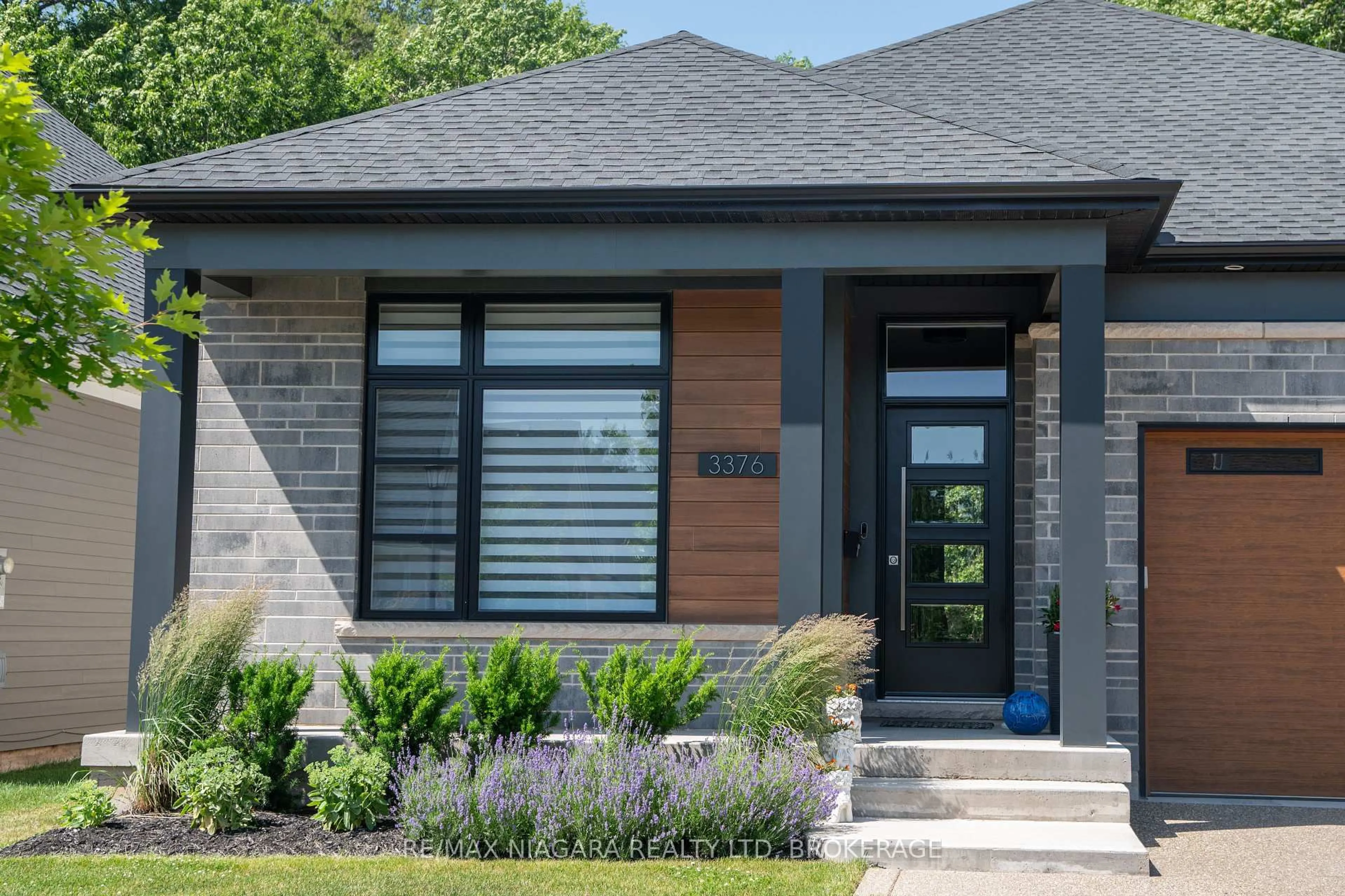 Home with brick exterior material, street for 3376 Whispering Woods Tr, Fort Erie Ontario L0S 1N0