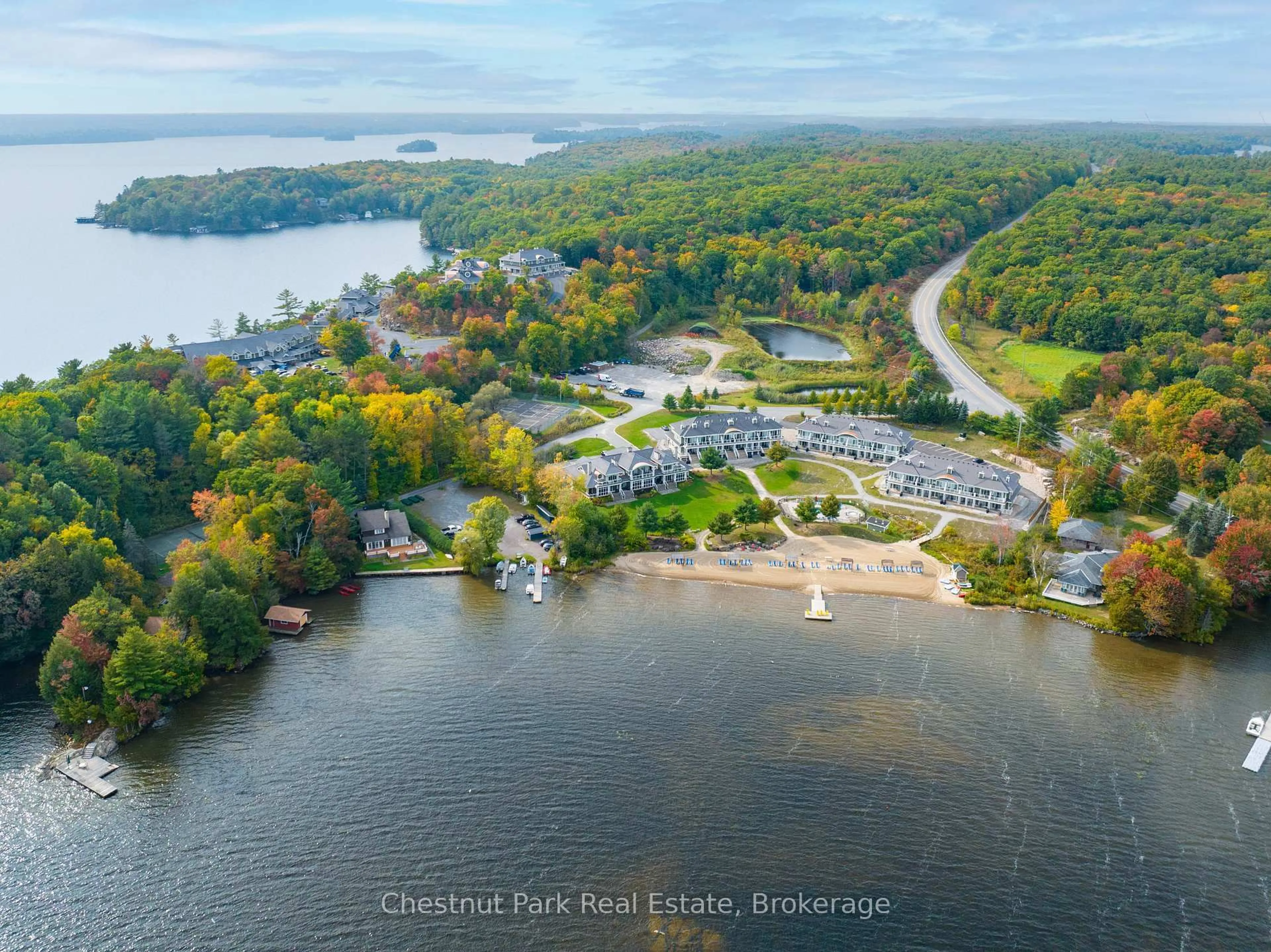 A pic from outside/outdoor area/front of a property/back of a property/a pic from drone, water/lake/river/ocean view for 1869 Muskoka Rd 118 Rd #L203-C1, Muskoka Lakes Ontario P1L 1W8