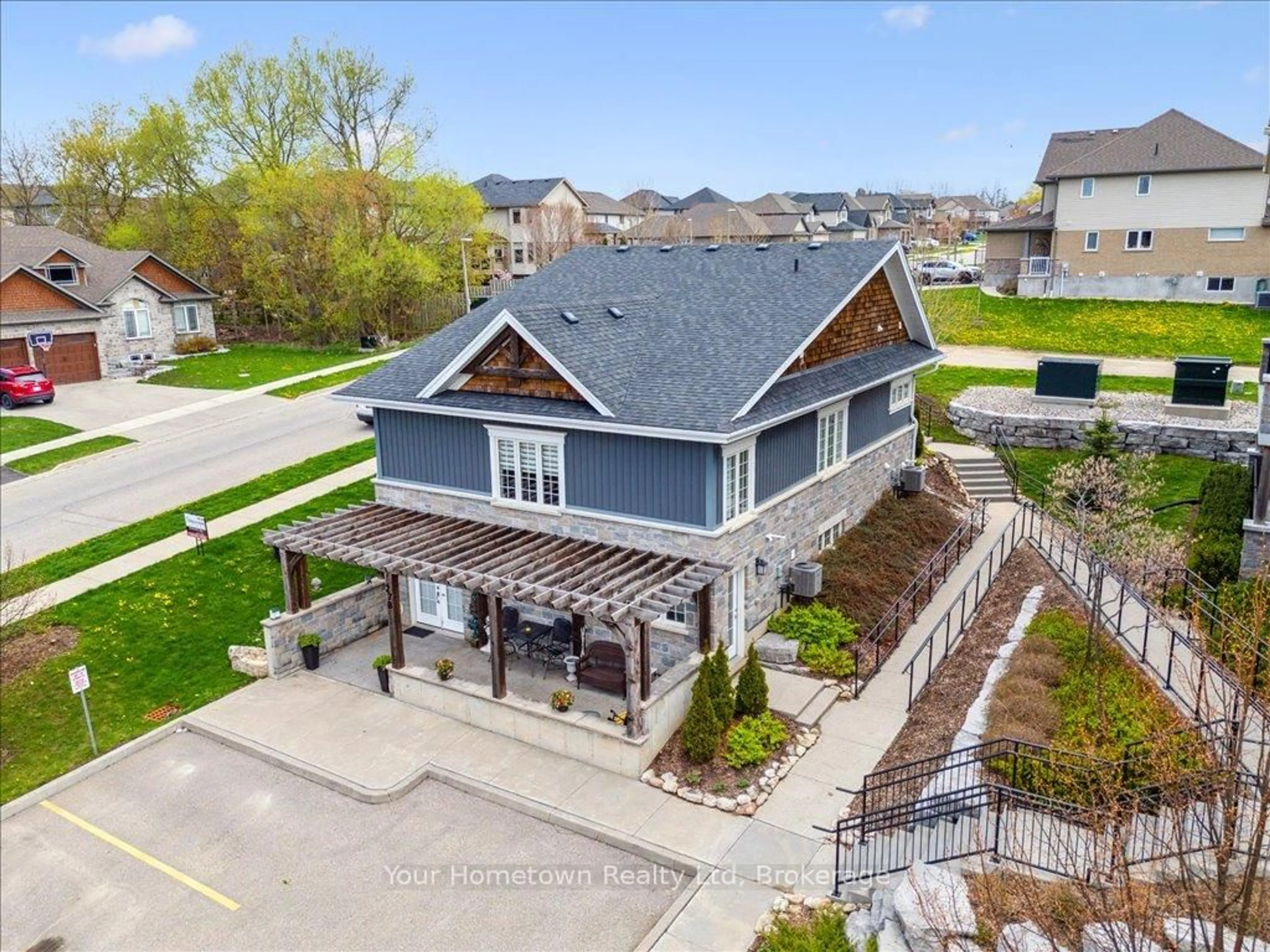 A pic from outside/outdoor area/front of a property/back of a property/a pic from drone, water/lake/river/ocean view for 27 Stumpf St #27B, Centre Wellington Ontario N0B 1S0