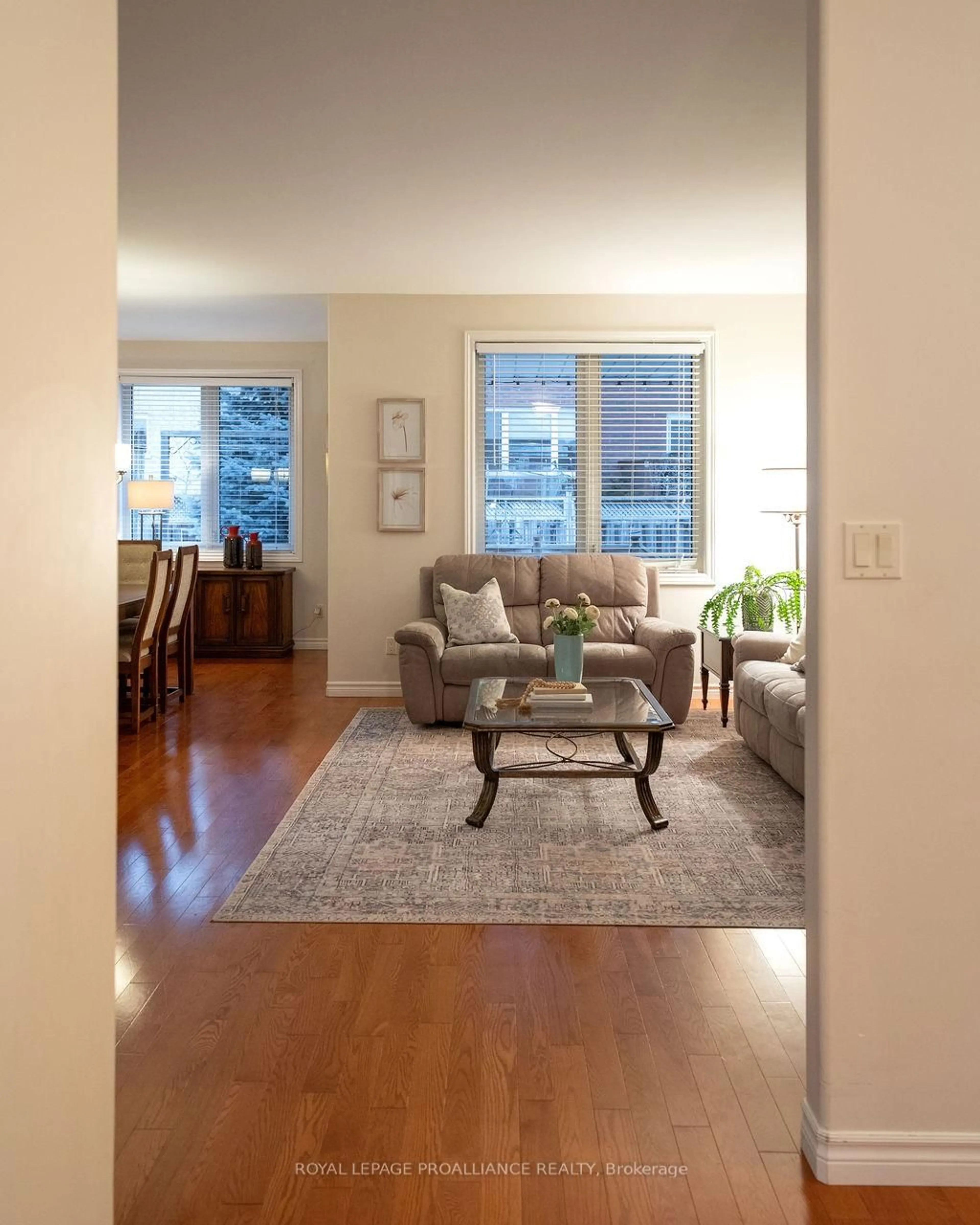 Living room with furniture, wood/laminate floor for 52 Simcoe Dr, Belleville Ontario K8N 4Z5