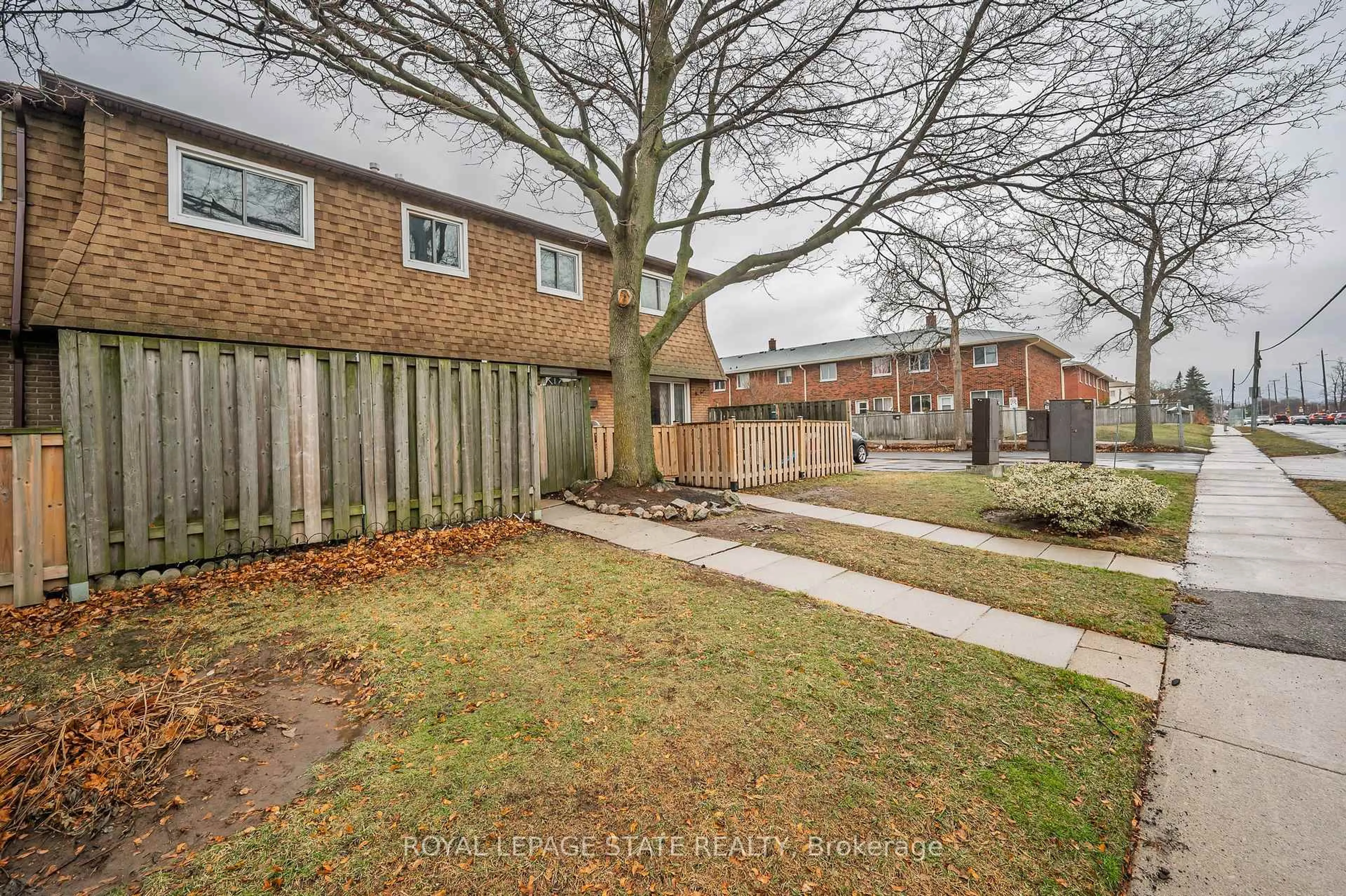 A pic from outside/outdoor area/front of a property/back of a property/a pic from drone, street for 165 Limeridge Rd #2, Hamilton Ontario L9C 2V4