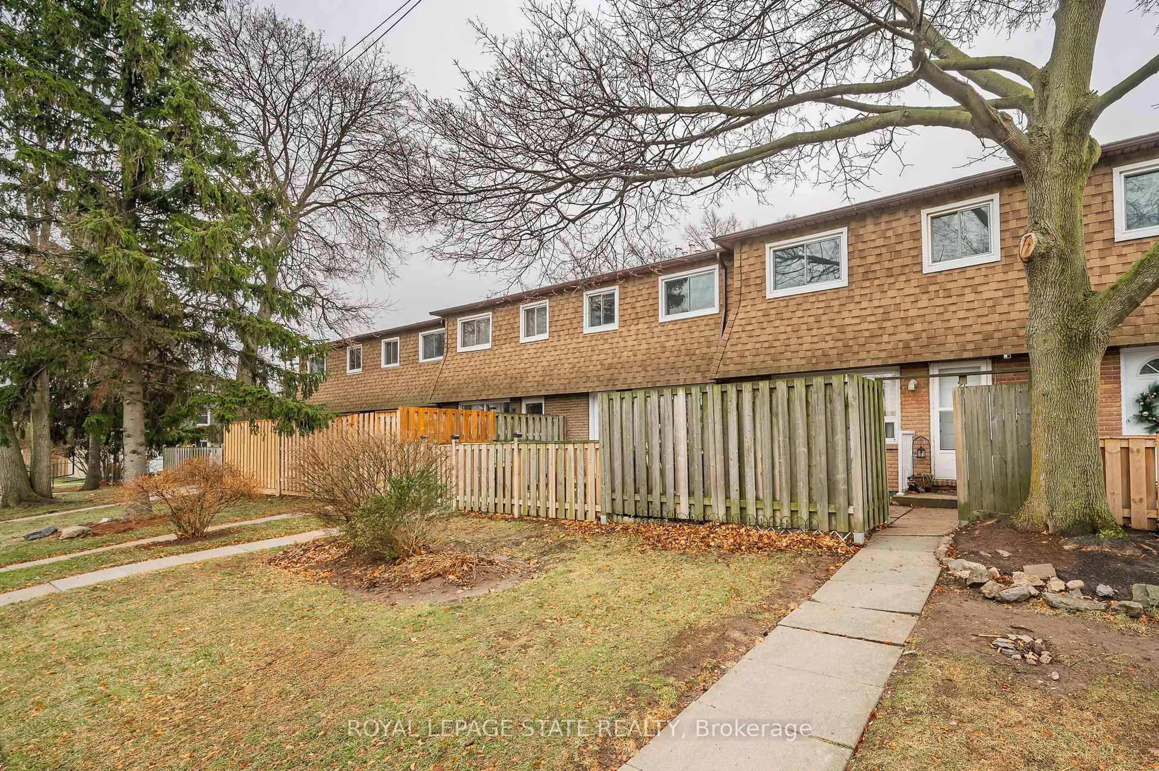A pic from outside/outdoor area/front of a property/back of a property/a pic from drone, street for 165 Limeridge Rd #2, Hamilton Ontario L9C 2V4