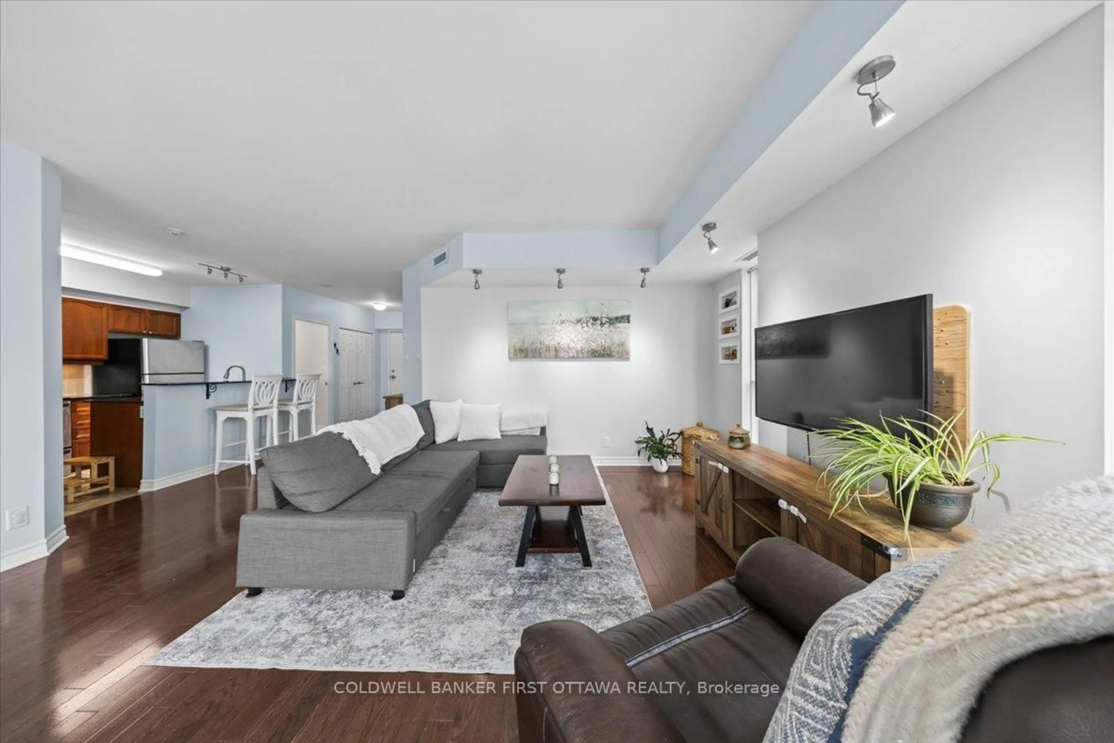 Living room with furniture, unknown for 445 Laurier Ave #1401, Ottawa Ontario K1R 0A2