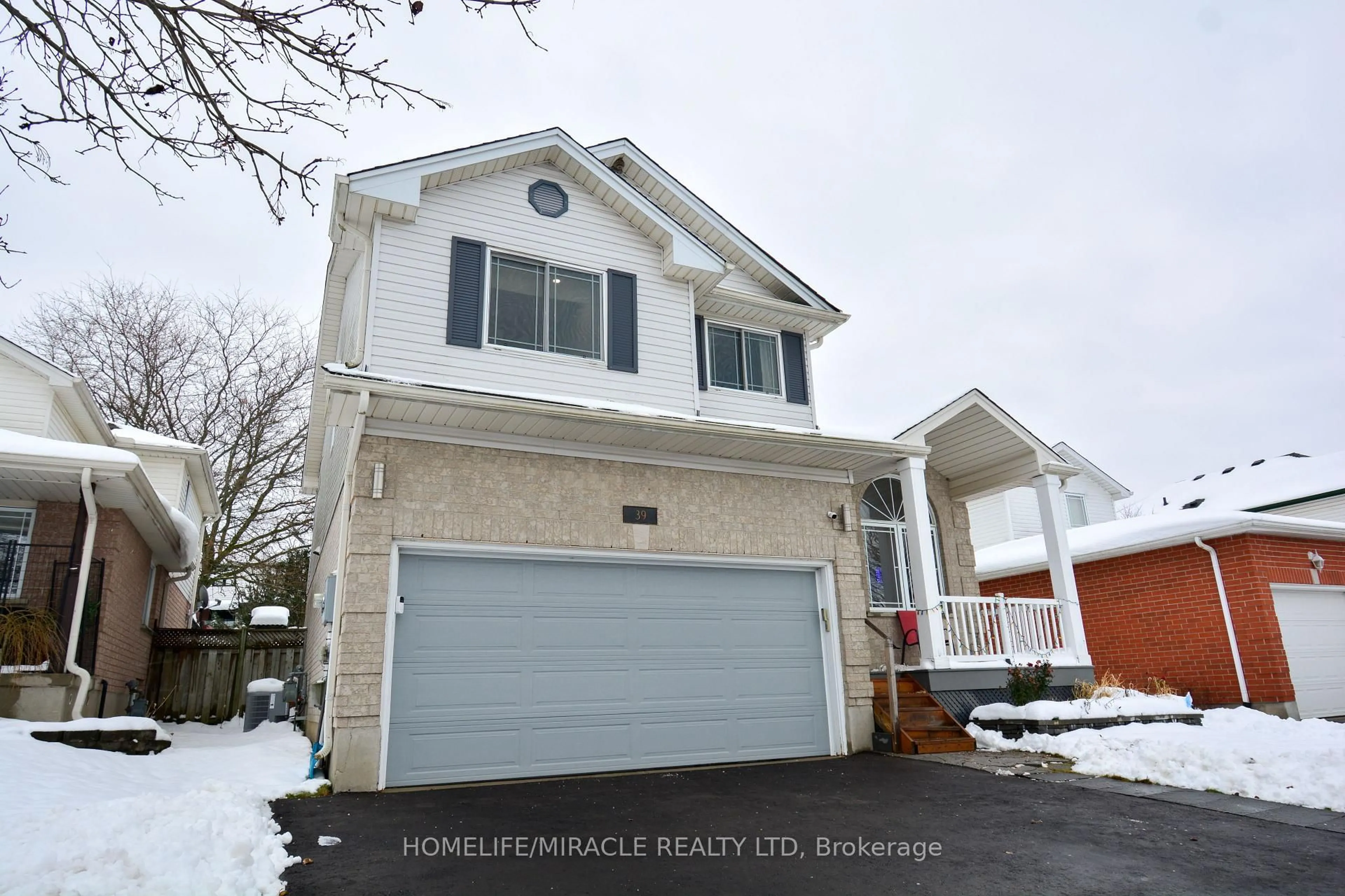 Home with vinyl exterior material, street for 39 Endeavour Dr, Cambridge Ontario N3C 4C4