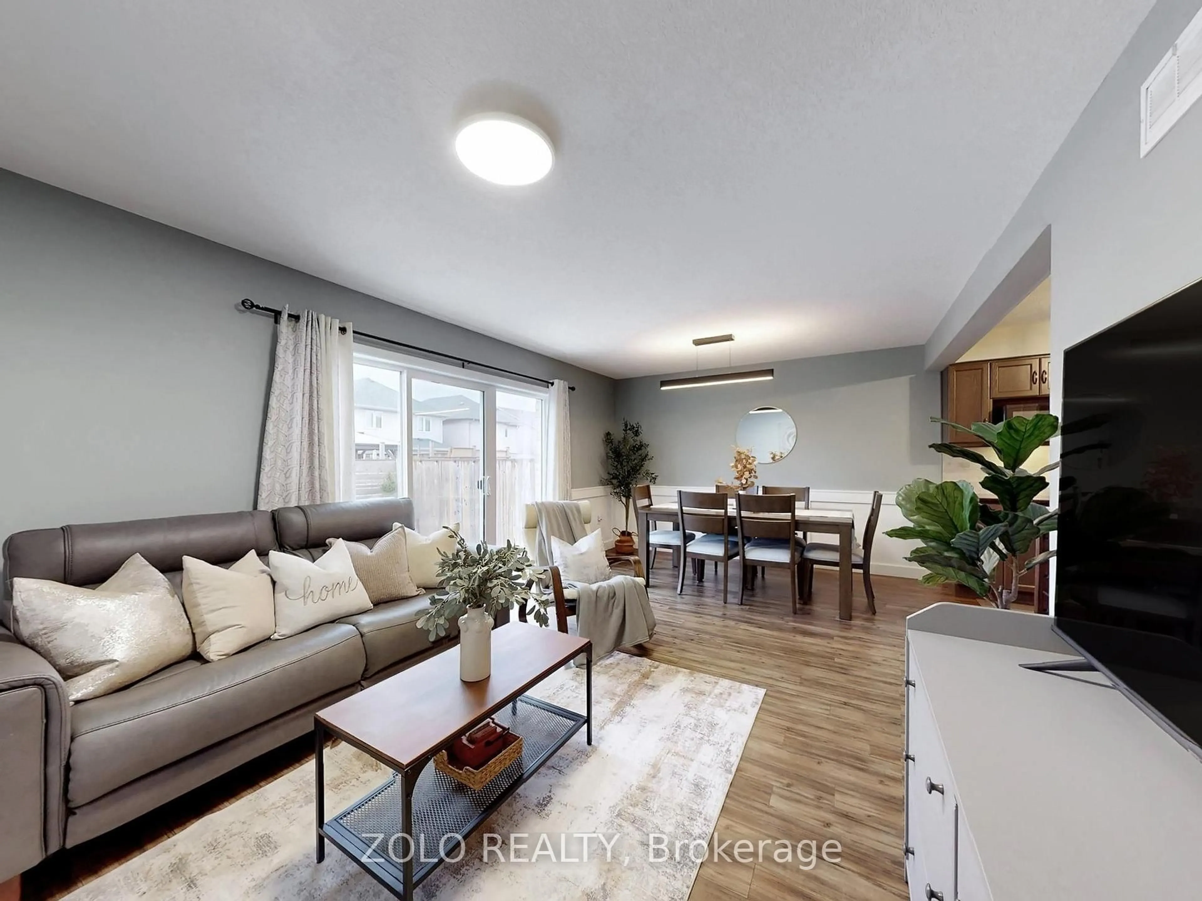 Living room with furniture, unknown for 33 Marshall Dr, Guelph Ontario N1E 0K7