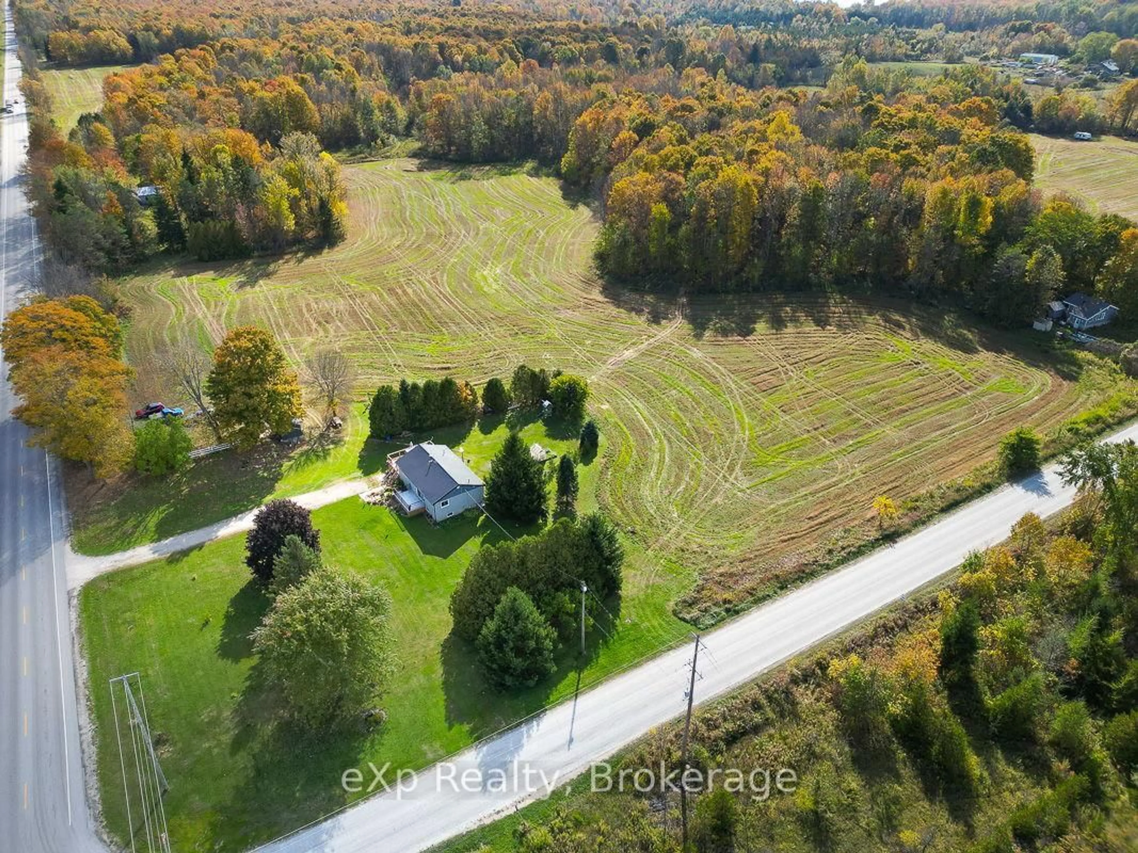 A pic from outside/outdoor area/front of a property/back of a property/a pic from drone, forest/trees view for 179422 Grey Road 17, Georgian Bluffs Ontario N0H 2T0