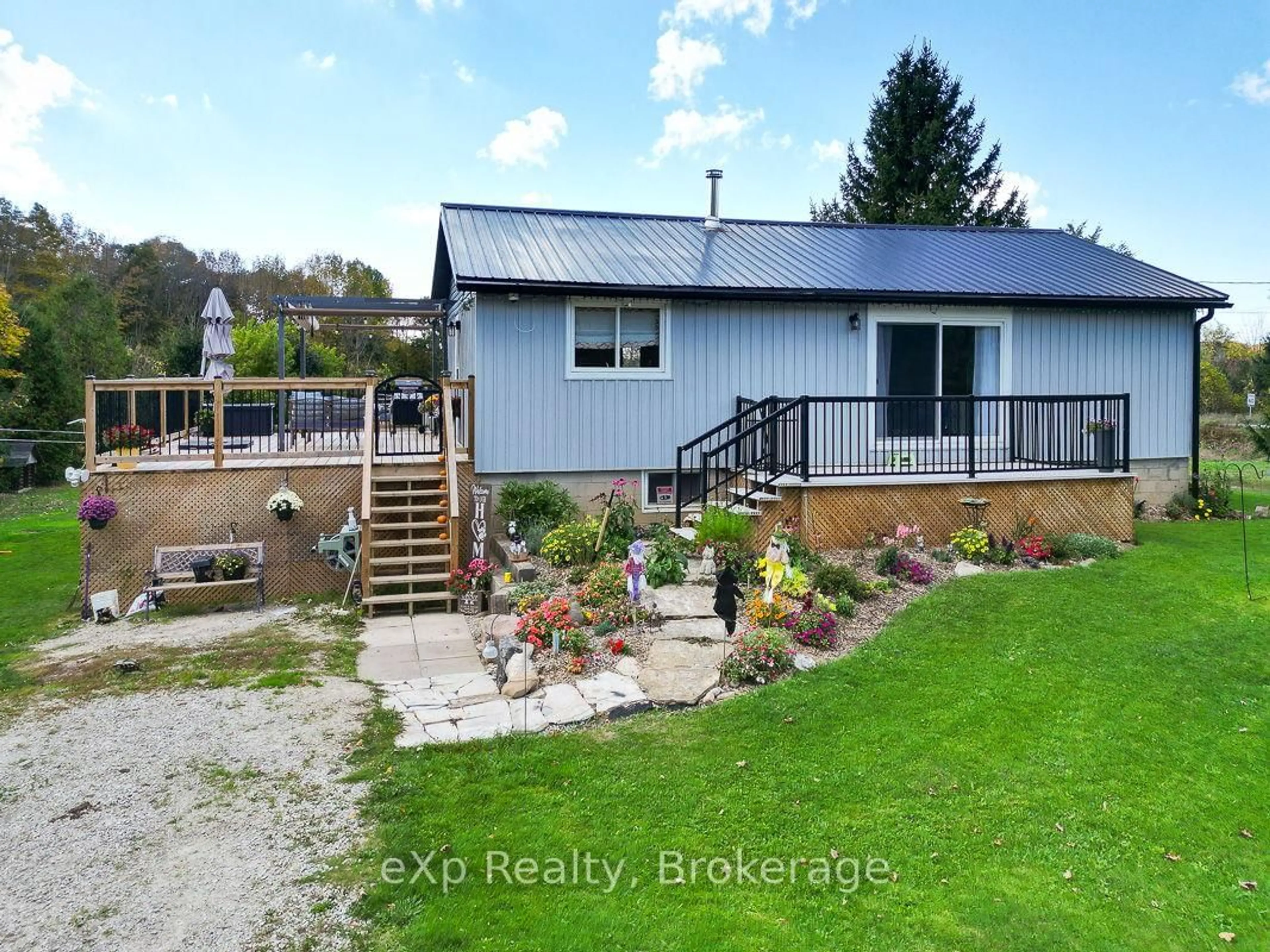 A pic from outside/outdoor area/front of a property/back of a property/a pic from drone, water/lake/river/ocean view for 179422 Grey Road 17, Georgian Bluffs Ontario N0H 2T0