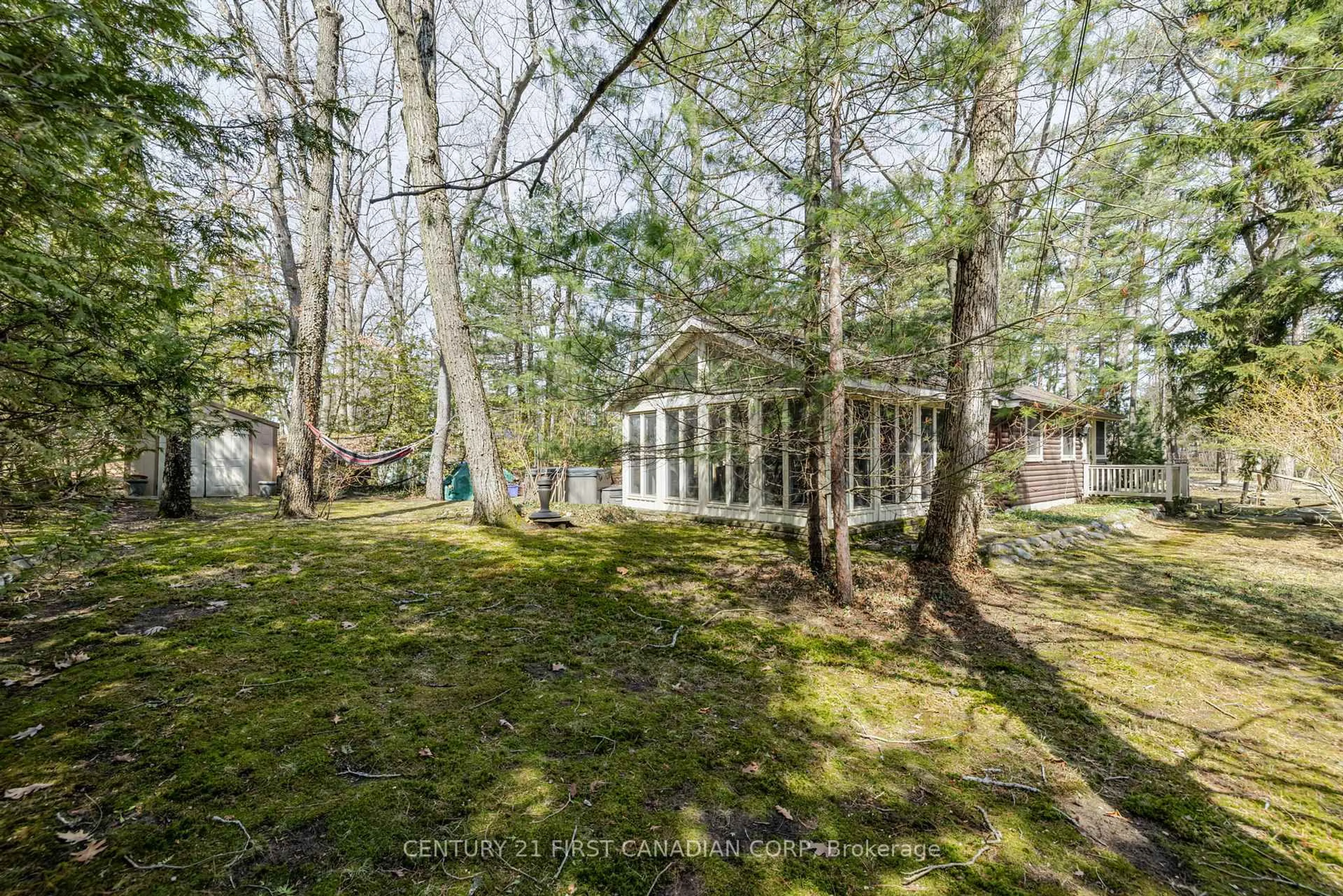 A pic from outside/outdoor area/front of a property/back of a property/a pic from drone, forest/trees view for 47 Heaman Cres, Lambton Shores Ontario N0M 1T0