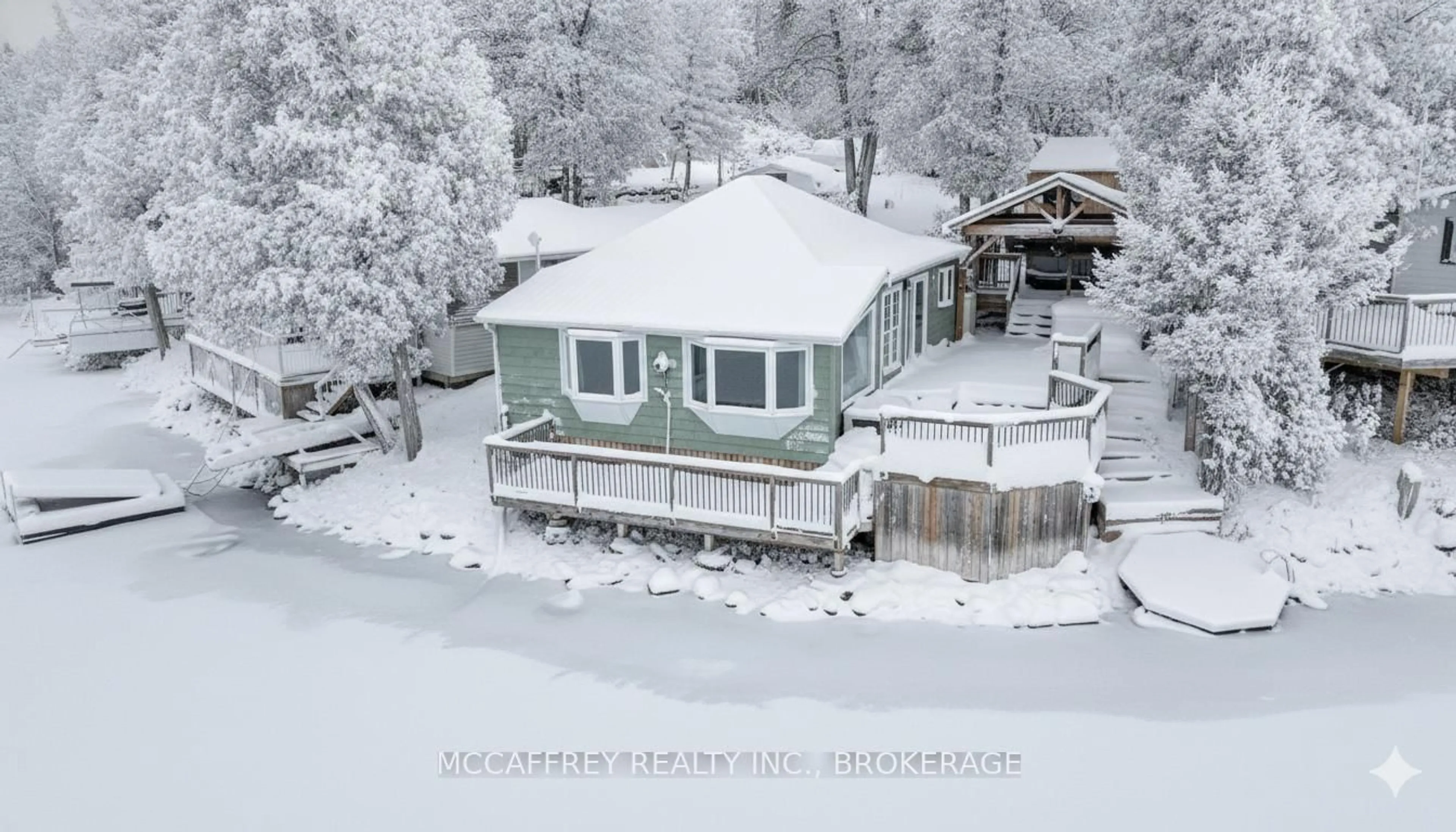 A pic from outside/outdoor area/front of a property/back of a property/a pic from drone, water/lake/river/ocean view for 19 Cherry Lane, Tamworth Ontario K0K 3G0